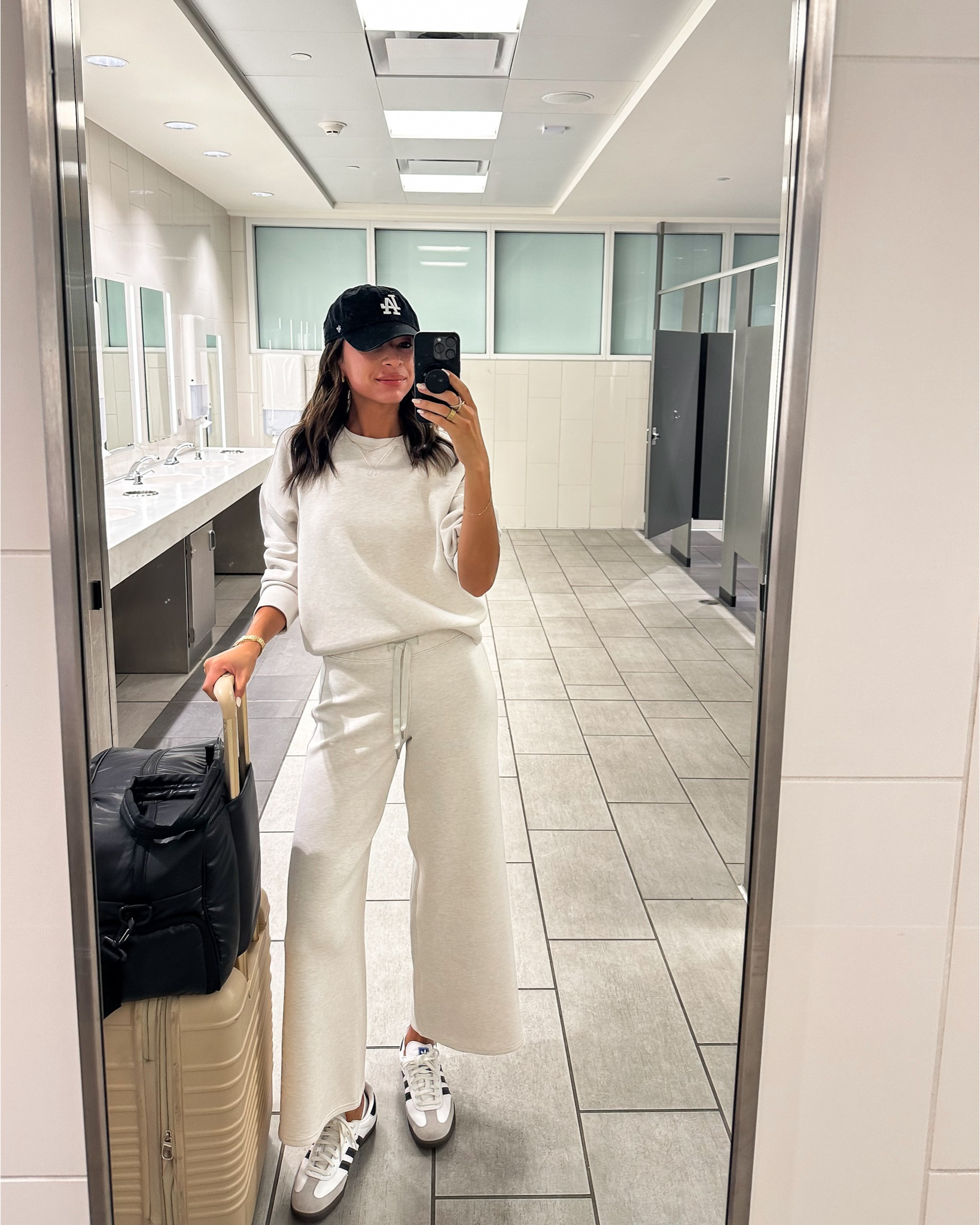 The best travel outfit for summer! Layering is my favorite way to achieve a practical and chic airport outfit ✈️ use code NENAXSPANX to save on set! Size XS TALL pants and S sweatshirt - the softest most luxe material everr

#LTKTravel #LTKFindsUnder100 #LTKStyleTip