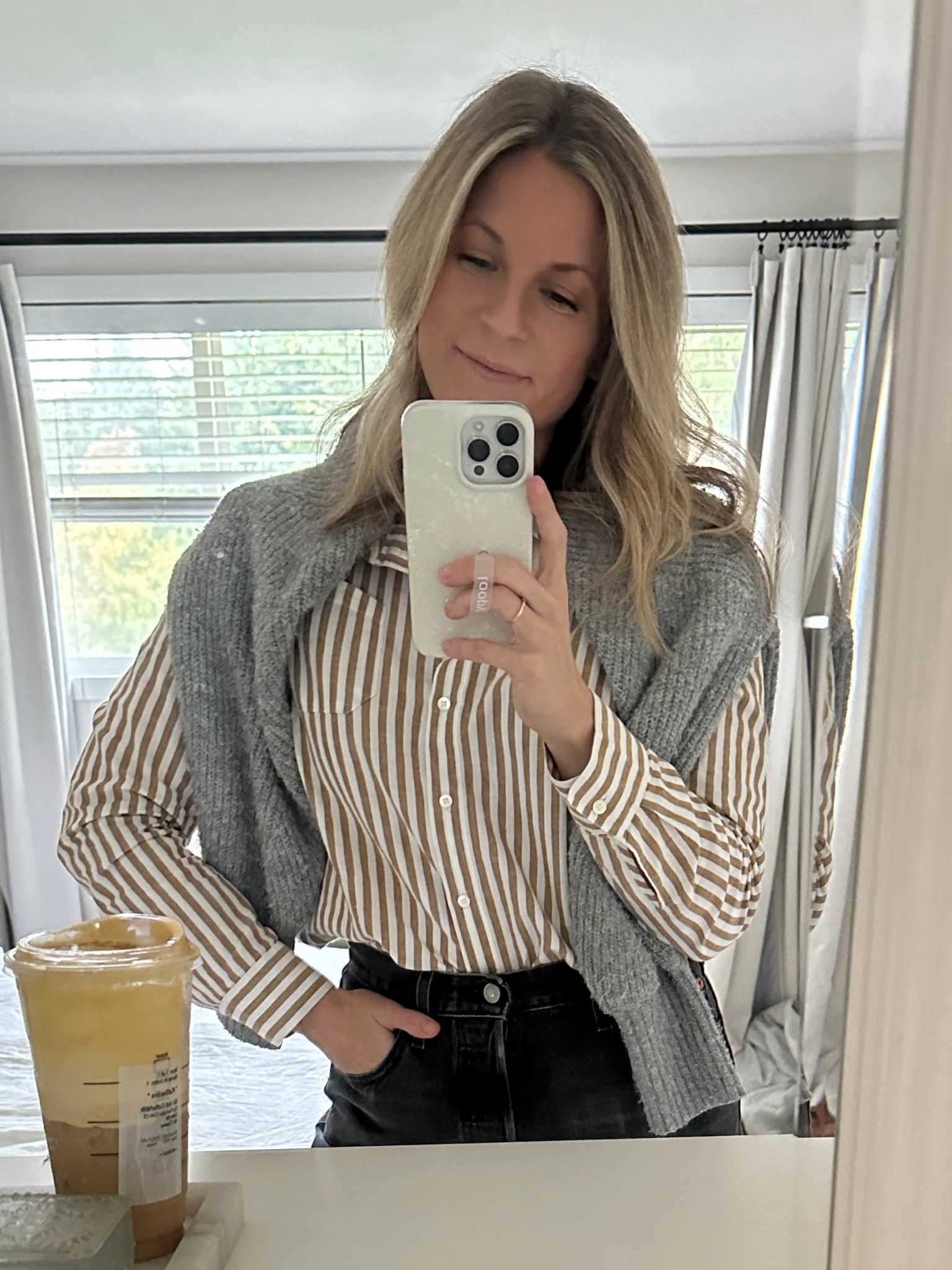 Fall outfit idea, striped button down shirt, gray sweater, black denim 

#LTKSeasonal #LTKstyletip #LTKworkwear