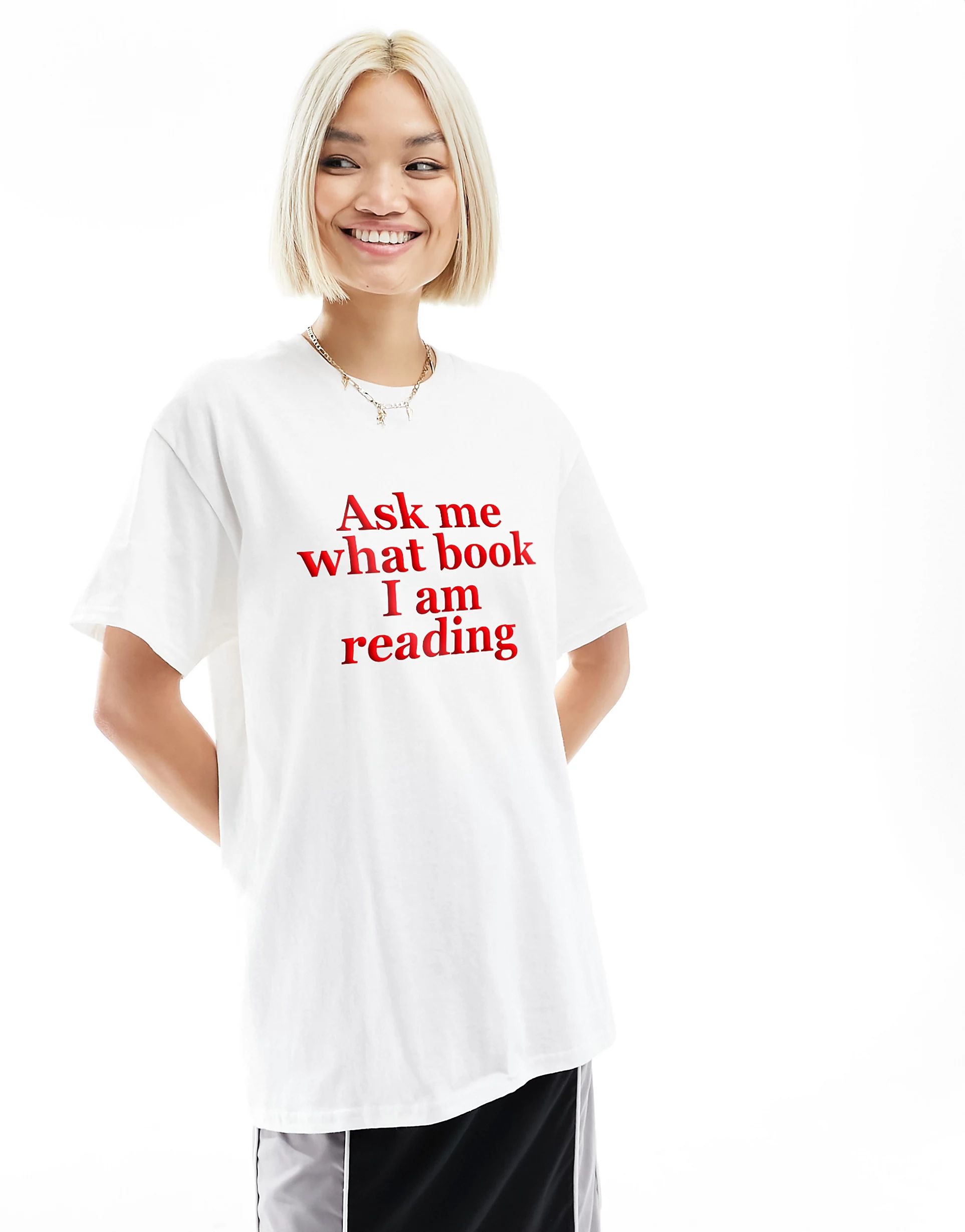 ASOS DESIGN oversized t-shirt with book slogan graphic in white | ASOS (Global)