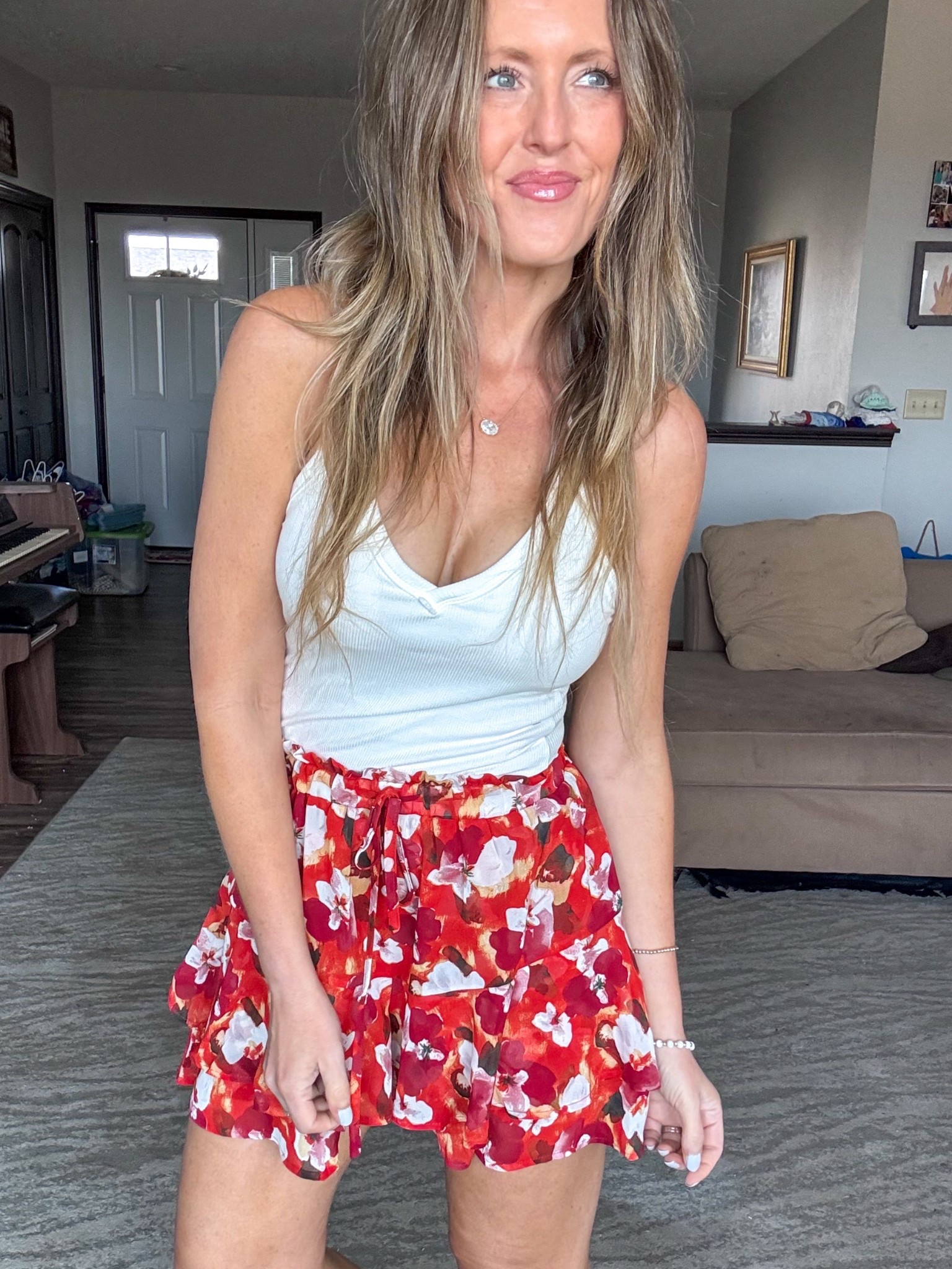 These flowy chiffon shorts are absolutely adorable and how pretty is this floral print! ❤️ Wearing an xsmall in the tank and a small in the shorts. 

As an Amazon Influencer I earn commission on qualifying purchases.

Spring casual fashion, flowy shorts, floral print shirts, white built in bra tank top, mom style, spring fashion 2026

#LTKOver40 #LTKootd #LTKMidsize