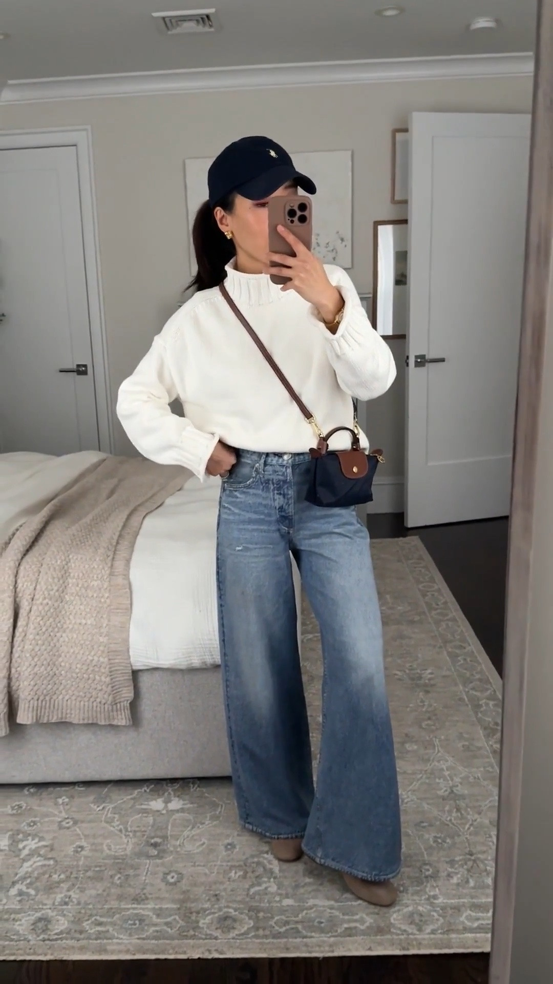 PLS READ below for denim sizing and shrinkage info👇 
• Jcrew sweater xxs, oversized fit, thicker knit, shrinks a little in dryer
• Rag and Bone “Miramar Sofie Ankle" jeans sz 23 in Minetta. Runs big! go down 1 size at the waist. 

Their “ankle” is a 30” inseam that I machine dried to shrink to 27.5”. All Miramar styles shrink in length if machine dried. I machine dried on medium for 20 min increments and checked til length was perfect

If you are very petite then get their Andi Cropped style linked below with 26.5” inseam but KEEP out of machine dryer 

• Gentle Souls booties 5.5, size up half if between sizes. since the front toe felt a little narrow across. Very comfy 

• Longchamp mini bag with Amazon detachable strap kit

• Polo hat

Easy mom outfit, fall style , petite friendly sweatpants jeans, chunky sweater

#LTKootd #LTKmomlife #LTKPetite