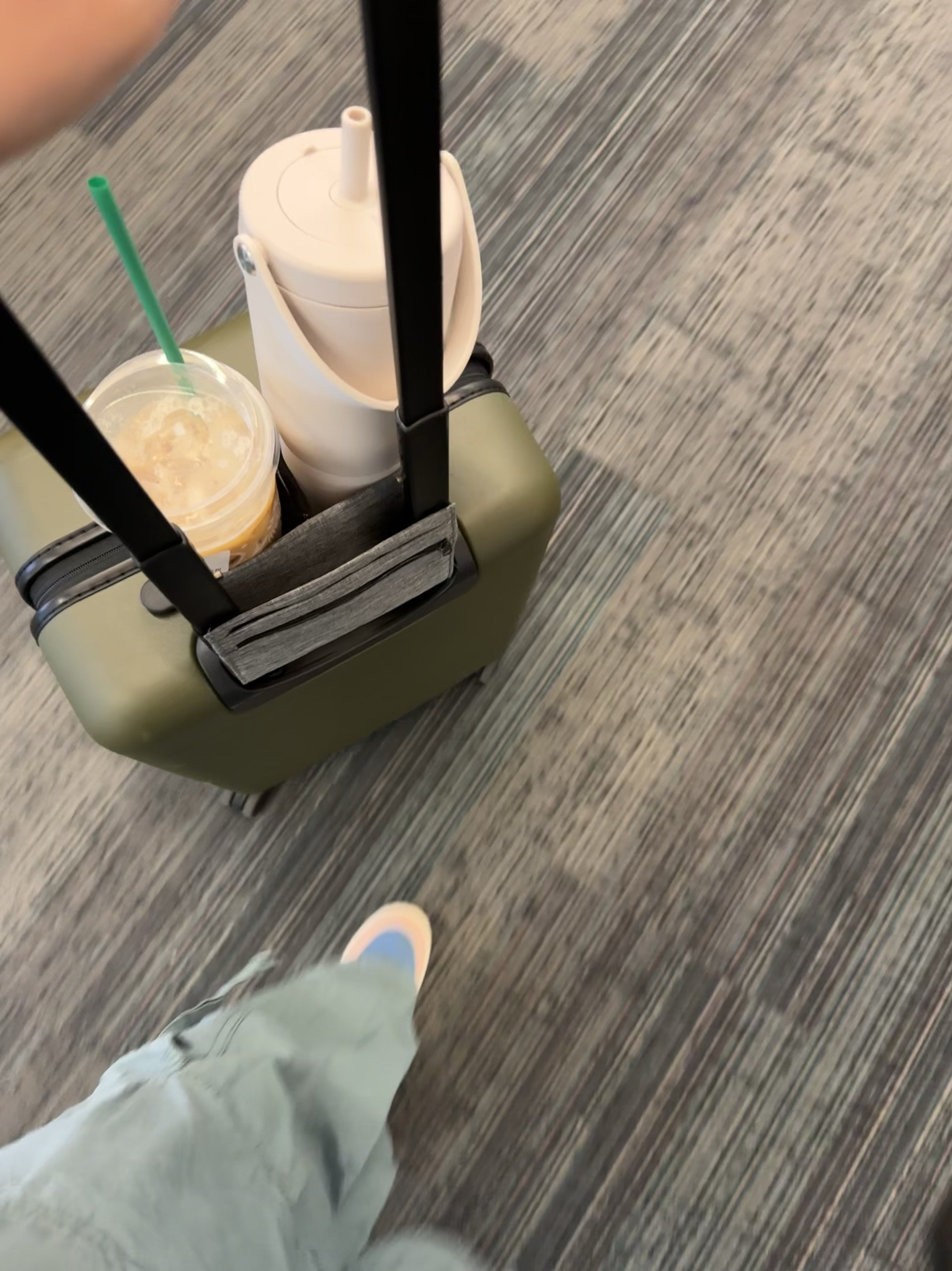 Travel day essentials. This luggage set up is my biggest luxury. You can’t go wrong with an away bag. My family has 2 and adding a cup holder for my airport coffee… the best. My exact cup holder is old but linked a similar even better one! They slide right on the handle!

#LTKTravel #LTKFindsUnder50 #LTKWatchNow