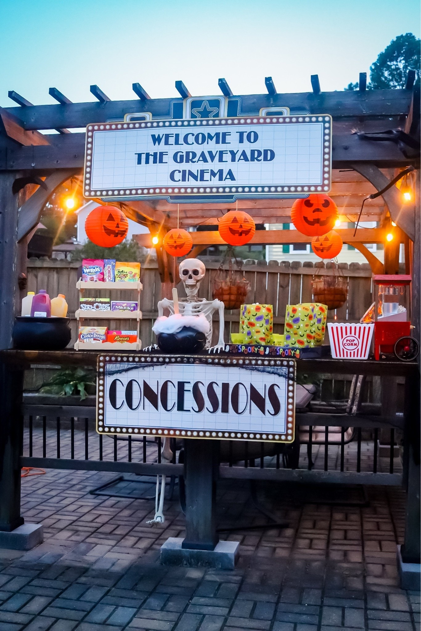Outdoor Halloween movie night and concessions set up 🎥
@orientaltrading 

#OTCPartner / Halloween decor / outdoor movie night / movie screen

#LTKSeasonal #LTKHome