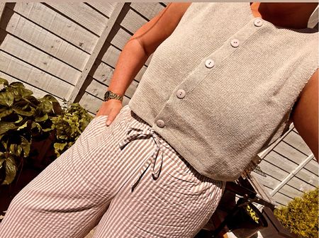 A beautiful knit vest paired with my tan striped linen trousers such a beautiful combo for the slightly less warmer summer days 🤎

#LTKcurves #LTKstyletip #LTKFind