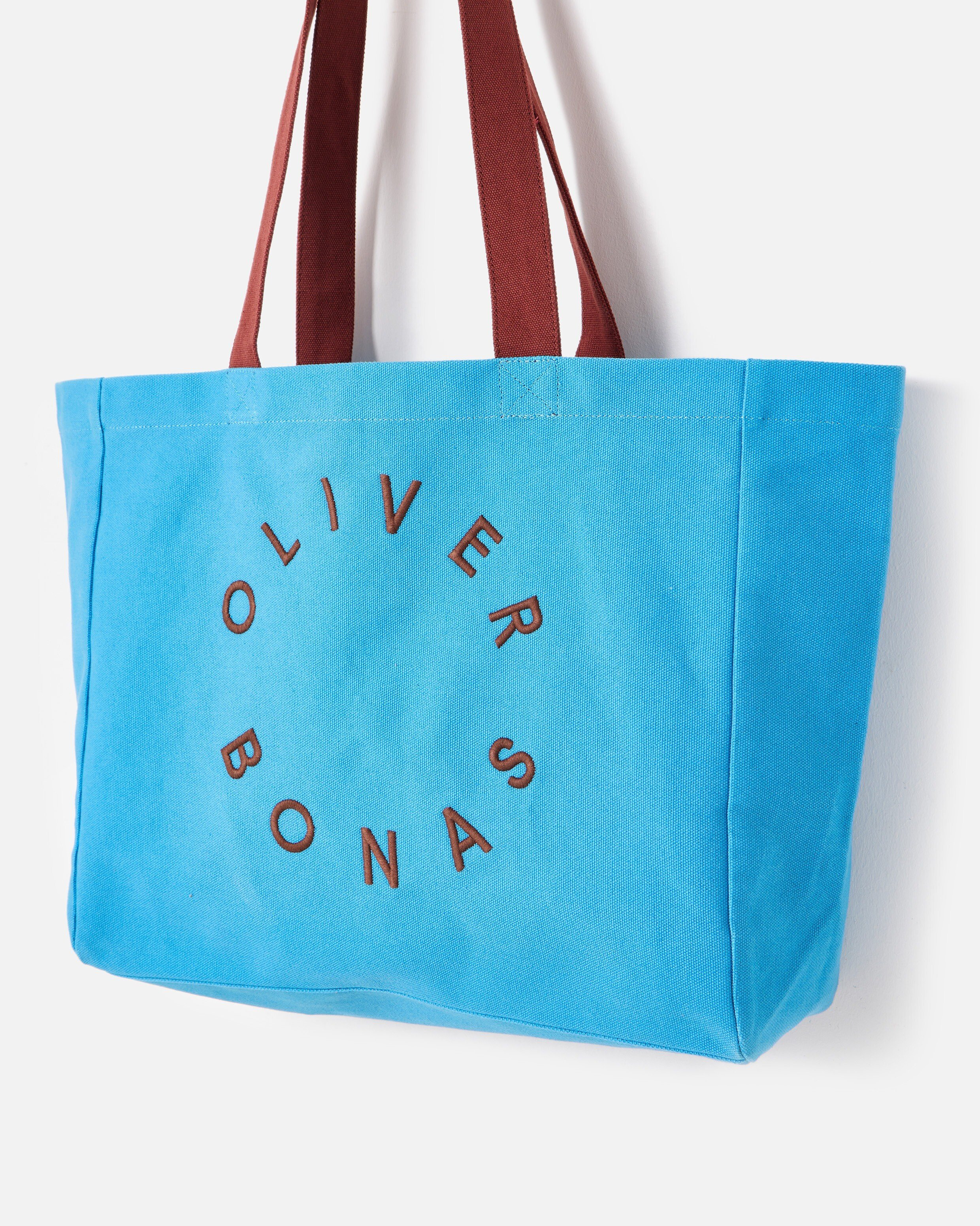 Blue & Chocolate Brown Logo Fabric Tote Shopper Bag | Oliver Bonas | Oliver Bonas (Global)