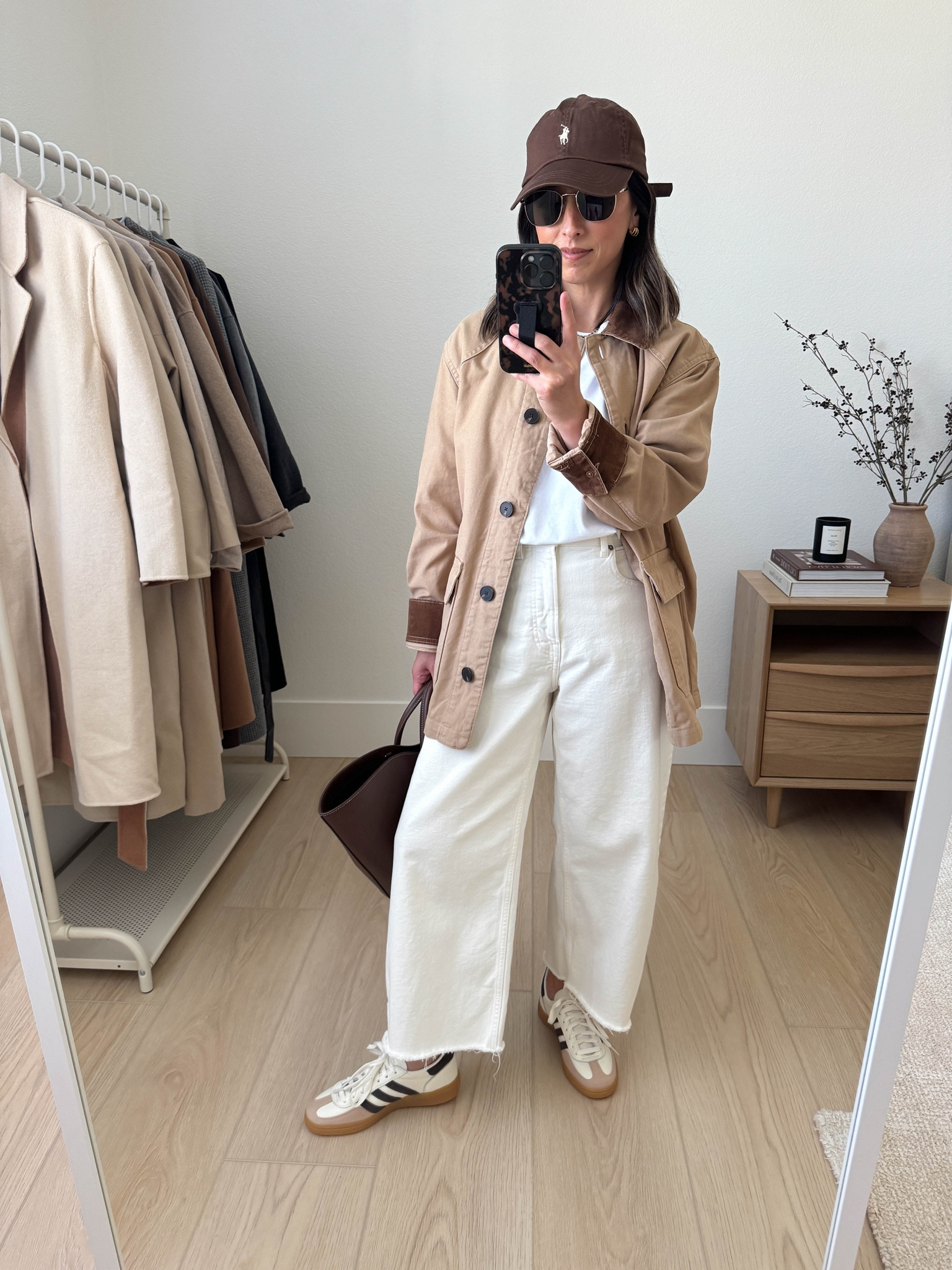 Summer to fall transitional outfits. How to style white jeans in the fall

Everlane barn jacket small
Everlane jeans 26, sized up and cut hems
Adidas Spezial sneakers 4 mens. Run a half size big
Everlane tee medium
Polo Ralph Lauren hat
Lifter tote (old)
Le Spec sunglasses 
J.Crew earrings

#LTKStyleTip #LTKSeasonal #LTKPetite