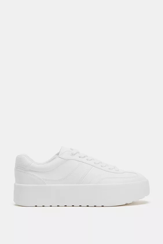 Sneakers. Contrast topstitching detail on the upper. Platform sole with lug sole. Lace-up closure... | Zara US