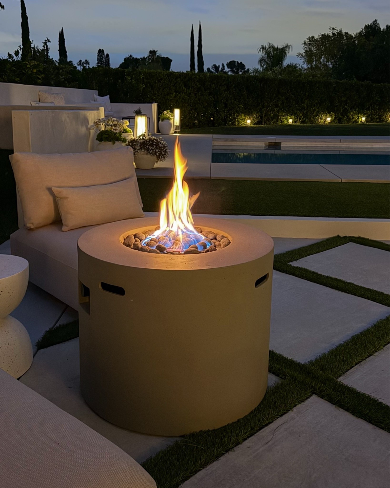 Outdoor fire pit from Wayfair! Love the enclosed tank! I added these modern gray lava rocks from Amazon!

#LTKHome #LTKSaleAlert #LTKSeasonal
