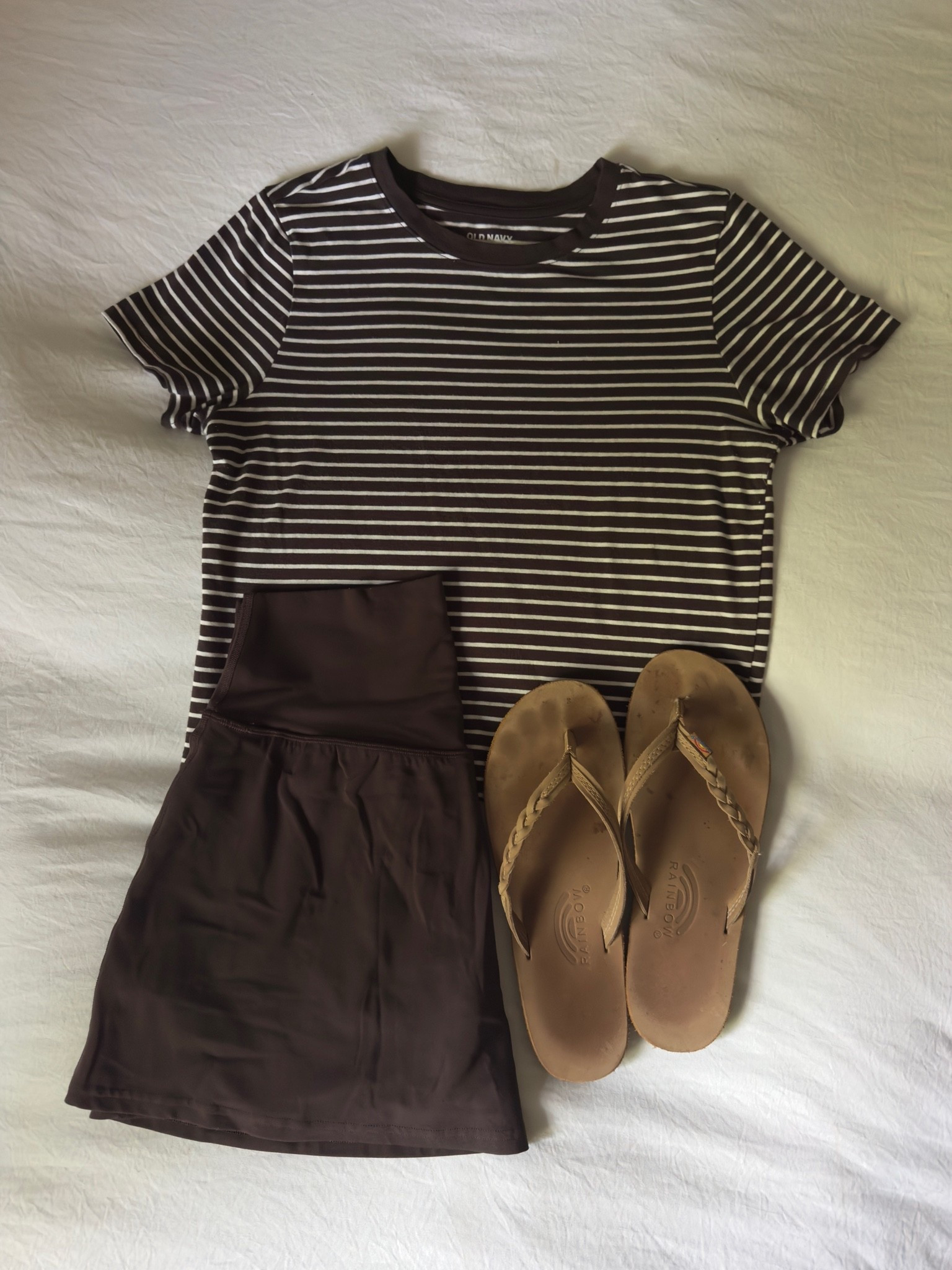 T-shirt + skirt 

#basicoutfit #casual #comfy #tennisskirt #lululemon #oldnavy #rainbowflipflops #chocolatebrown

#LTKootd #LTKSeasonal