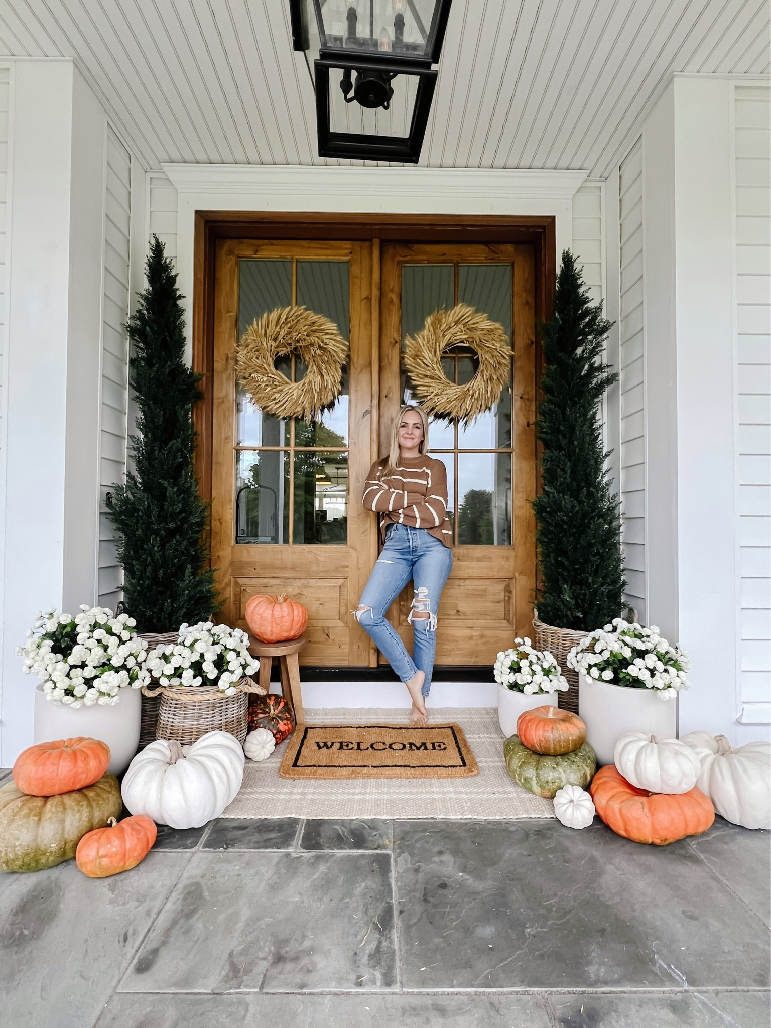 Fall front porch decor faux mums 

#LTKSeasonal #LTKhome #LTKfindsunder50