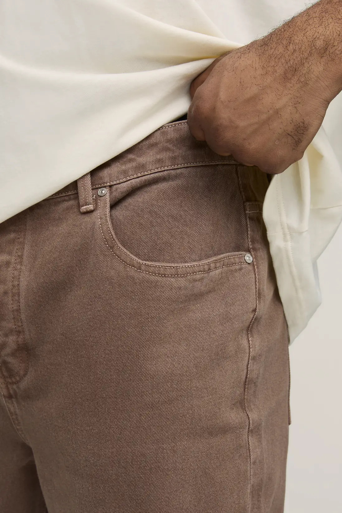 Brown boohooMAN Plus Tinted Washed Extreme Flared Jeans | Boohoo USA | boohoo (US & Canada)