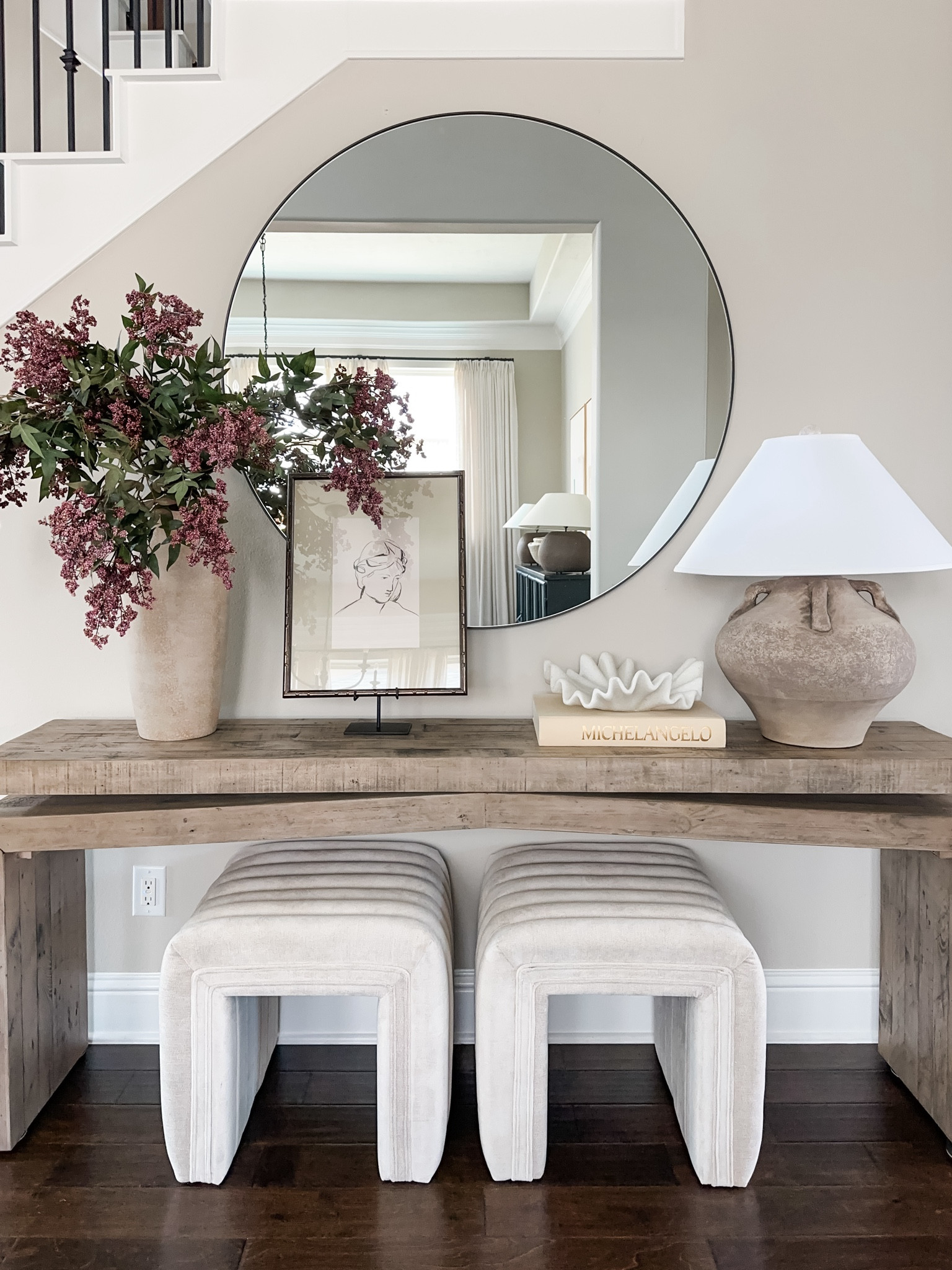 Linking everything you see here! From my best selling entryway console table to the art and easel and oversized mirror. And of course my favorite fall stems! 

The coffee table book is from a used book store and I took the cover off. I found one on eBay. 

#LTKHome #LTKFindsUnder100 #LTKSeasonal