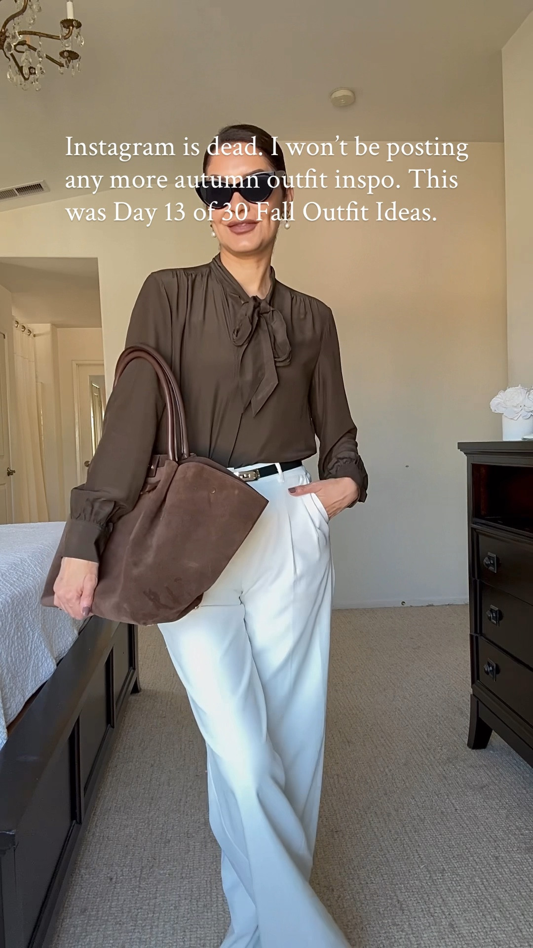 I am done. ⬇️
Apparently is all about the hook. Did it work?? You are here, so I guess yes.
But honestly, I put a lot of effort on my content and the algorithm is so complicated these days, so I will put minimal effort, music, dressing showing you the outfit that's it. Easy fall outfit idea.

➡️OUTFIT DETAILS
-blouse- size S
-pants- size 2 Regular 
-brown suede flats- tts
-bag @demellier