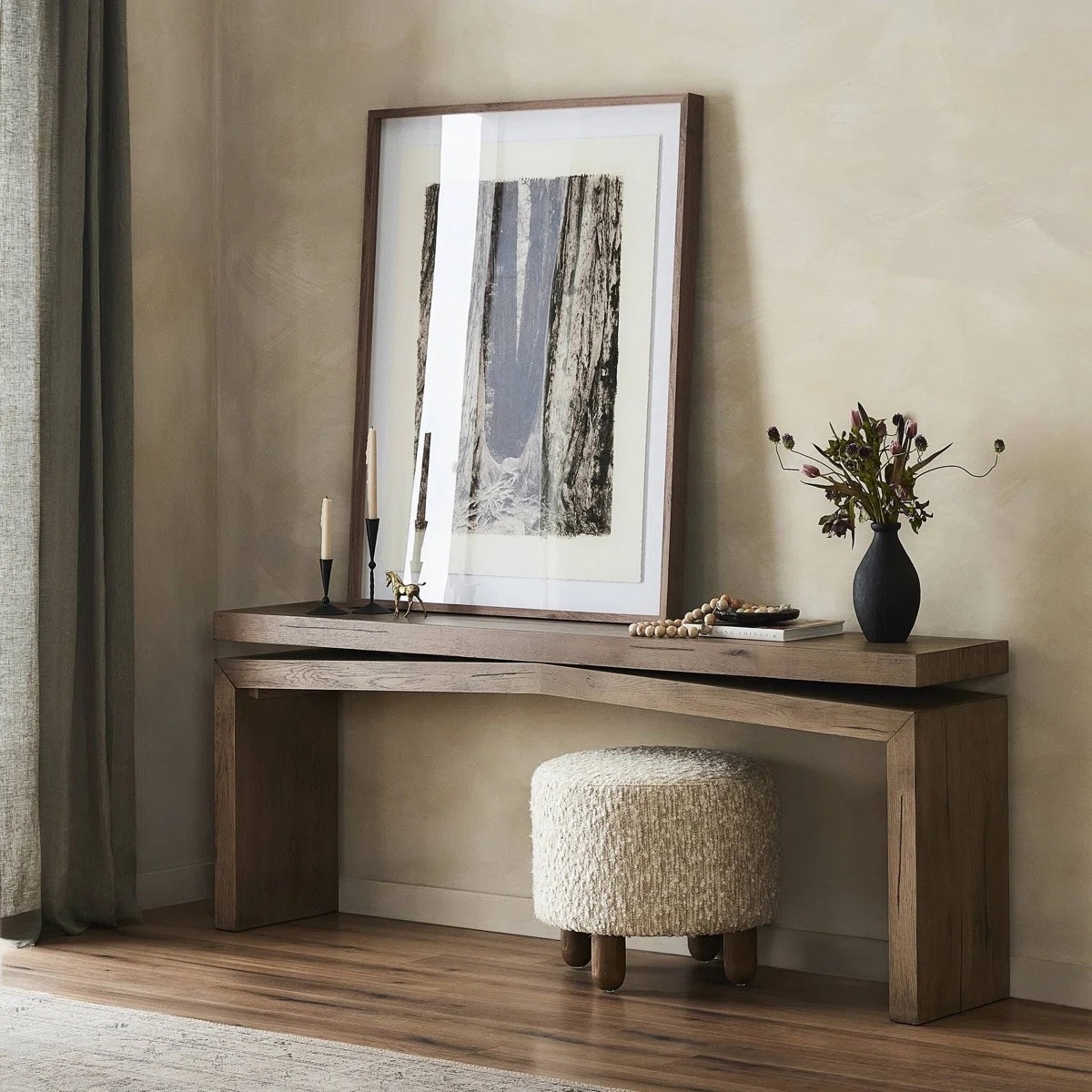 This console table is a rustic addition to your living room or entryway, offering a welcoming surface for your favorite décor. Crafted from solid wood, its weathered finish and natural grain variations create a warm, inviting look. 

#LTKHome