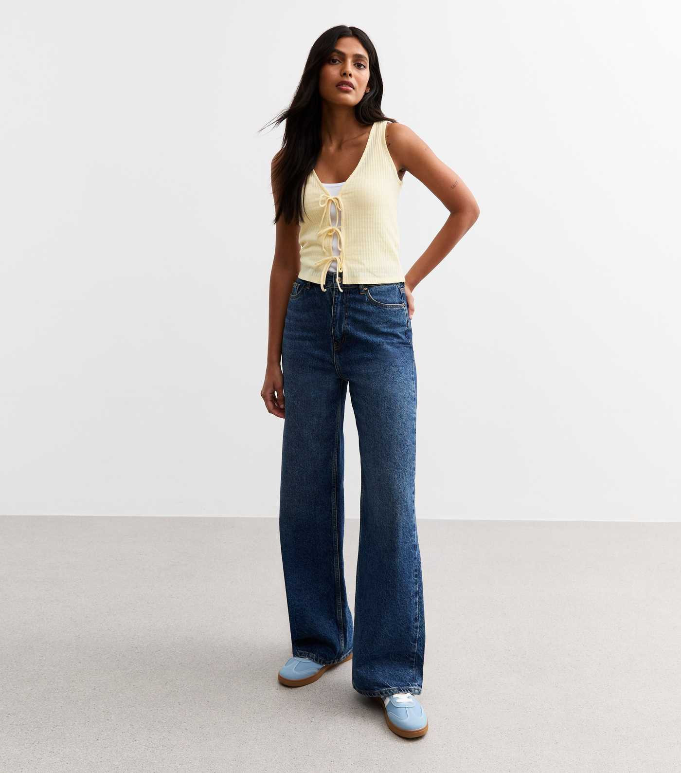 Light Yellow Ribbed Pointelle Effect Tie Front Vest
						
						Add to Saved Items
						Remove ... | New Look (UK)