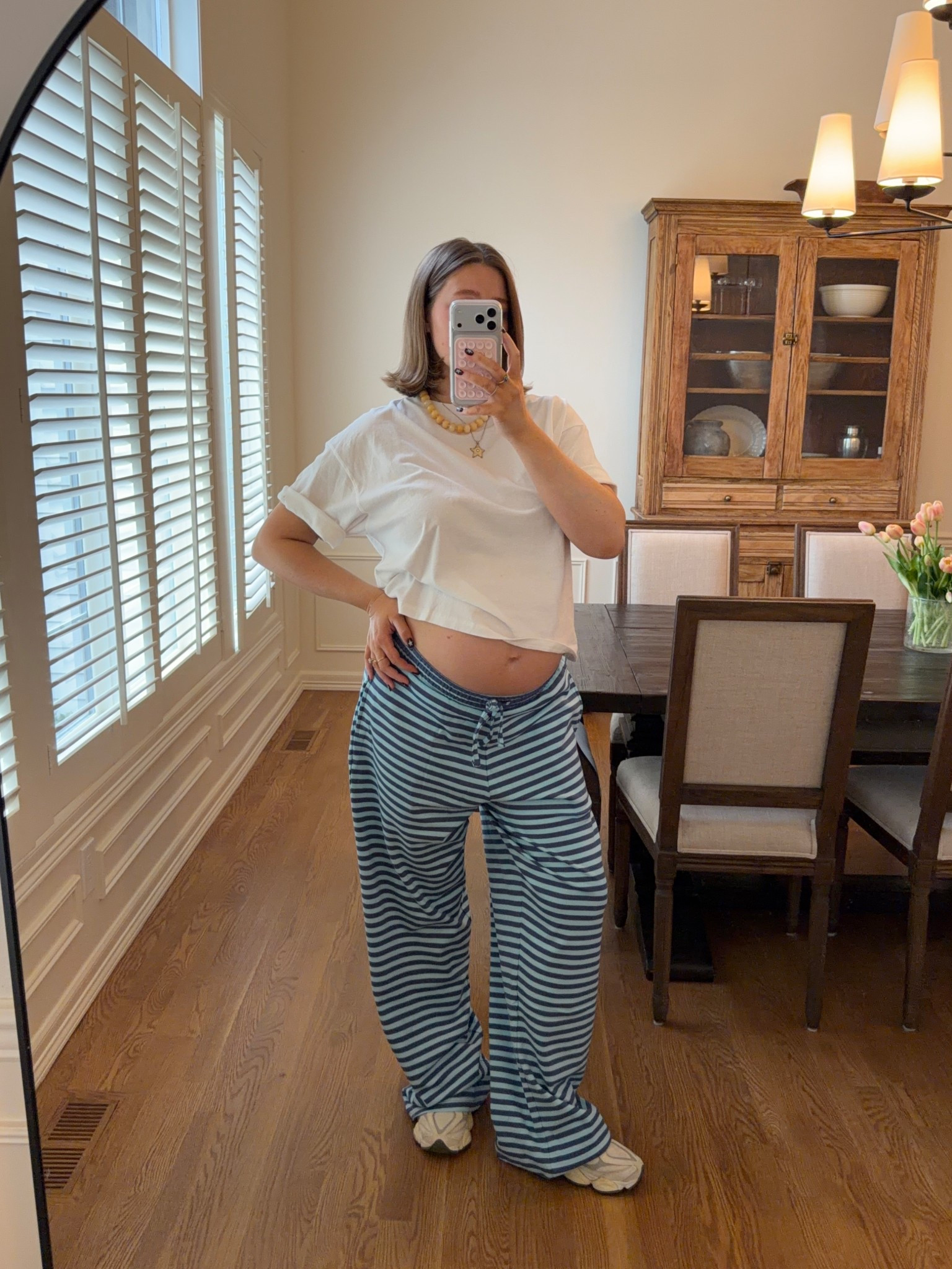 Size small in tee it runs really big  I always wear a M/L in daily drills even almost to my third trimester there’s plenty of room and stretch in shorts. Super oversized and slouchy which I love! I’m 5’ 5” and I always cuff the shorts once. 3 pack of socks from Amazon! New balance sneakers true to size I’ve had for a year now and they’re amazing

#dailydrills #casualstyle #bumpstyle #bresheppard #momstyle 