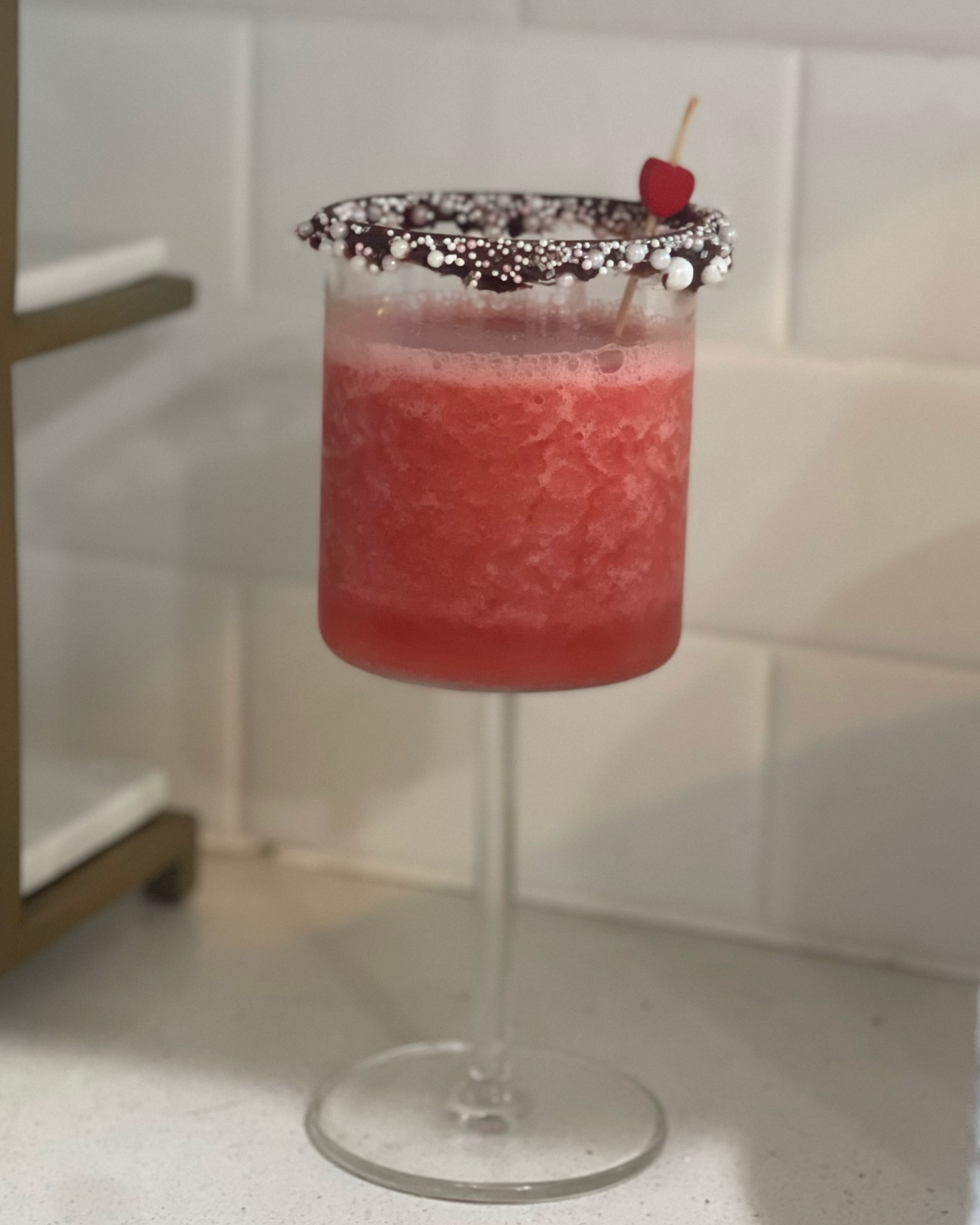 Strawberry slushies for Valentine’s Day! This mocktail looks great in this modern wine glass! I dipped the top of the glass in chocolate frosting and pink and white Valentine’s Day sprinkles. Valentine’s Day drink. Galentine’s Day party. Valentine’s Day entertaining. ❤️💗❤️ 

#LTKunder50 #LTKFind #LTKhome