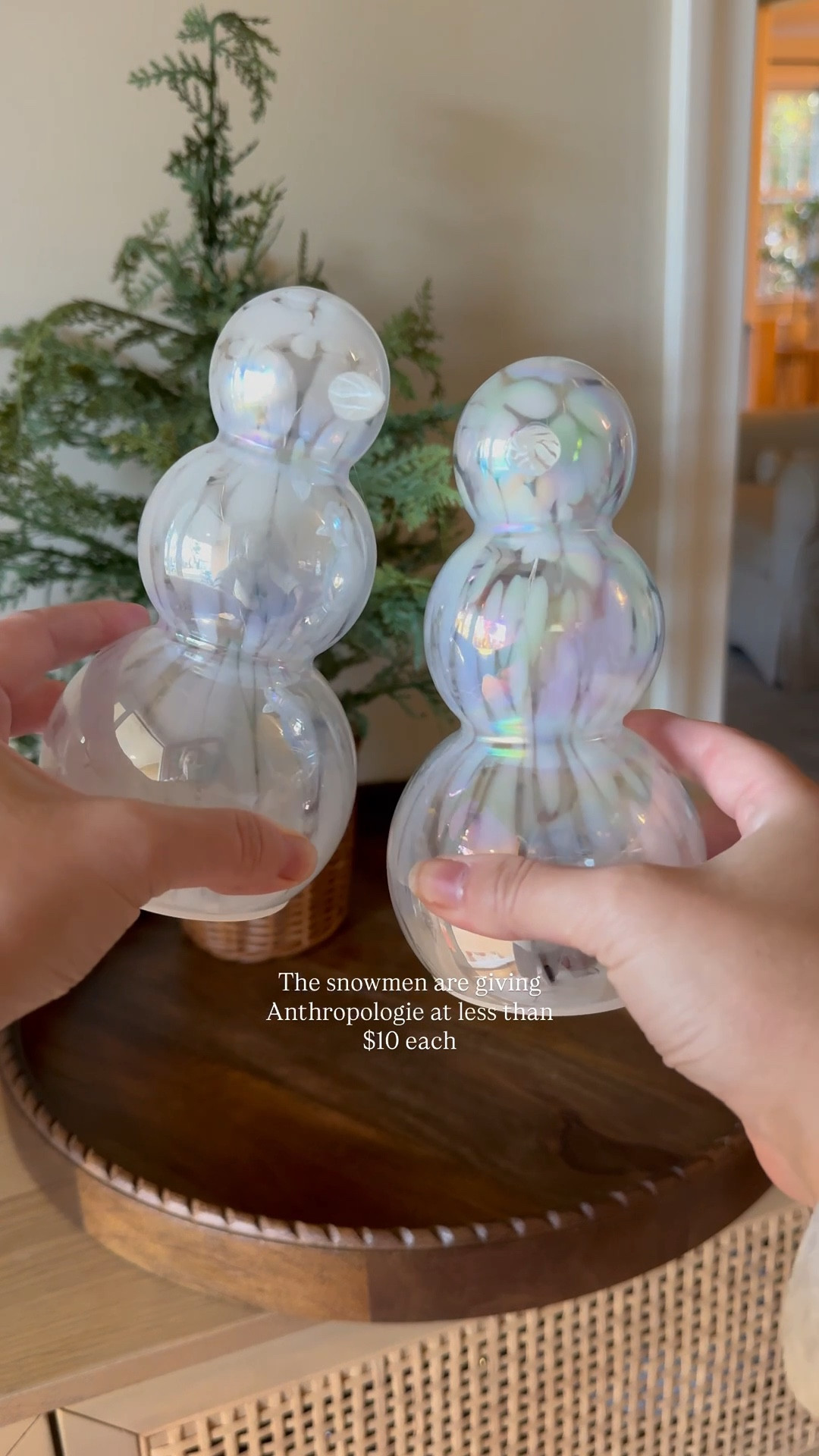 I couldn’t get over these snowmen, they are glass and they look so much like the anthro Halloween ghosts I’ve been loving this year. I paired them with the viral @mytexashouse mini tree which is so cute and these iridescent houses which I added twinkle lights to make them work at night. I am simply obsessed with @walmart Christmas so far and I cannot wait to share more! ✨