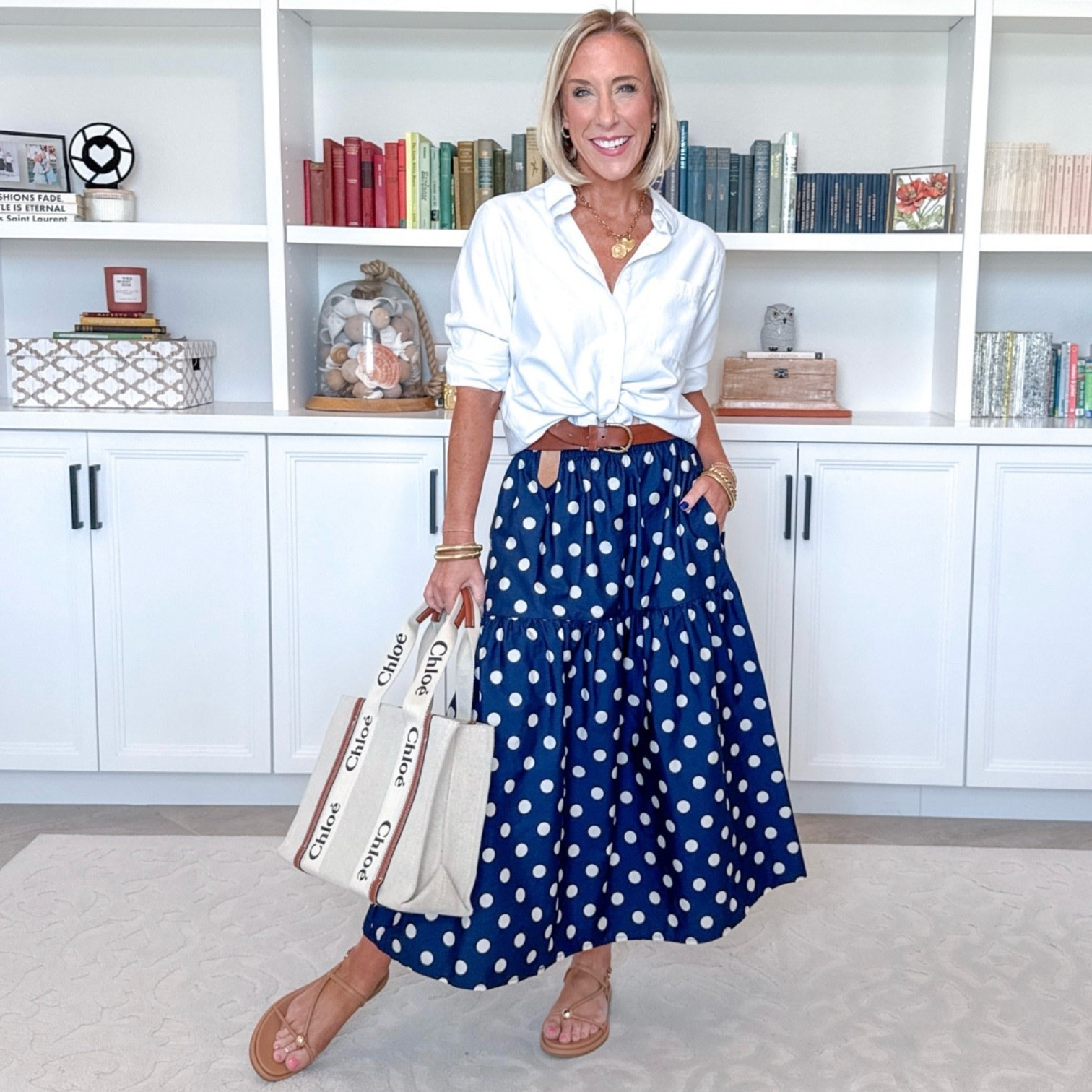One polka skirt - styled 8 ways: • Midi skirt - size XS. Not lined but not see through. Elastic waistband and pockets! White Button Down - size Small.

#LTKootd #LTKSeasonal #LTKOver40