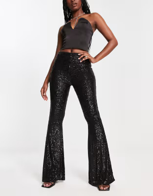 ASOS DESIGN extreme flare sequin pants in black | ASOS (Global)