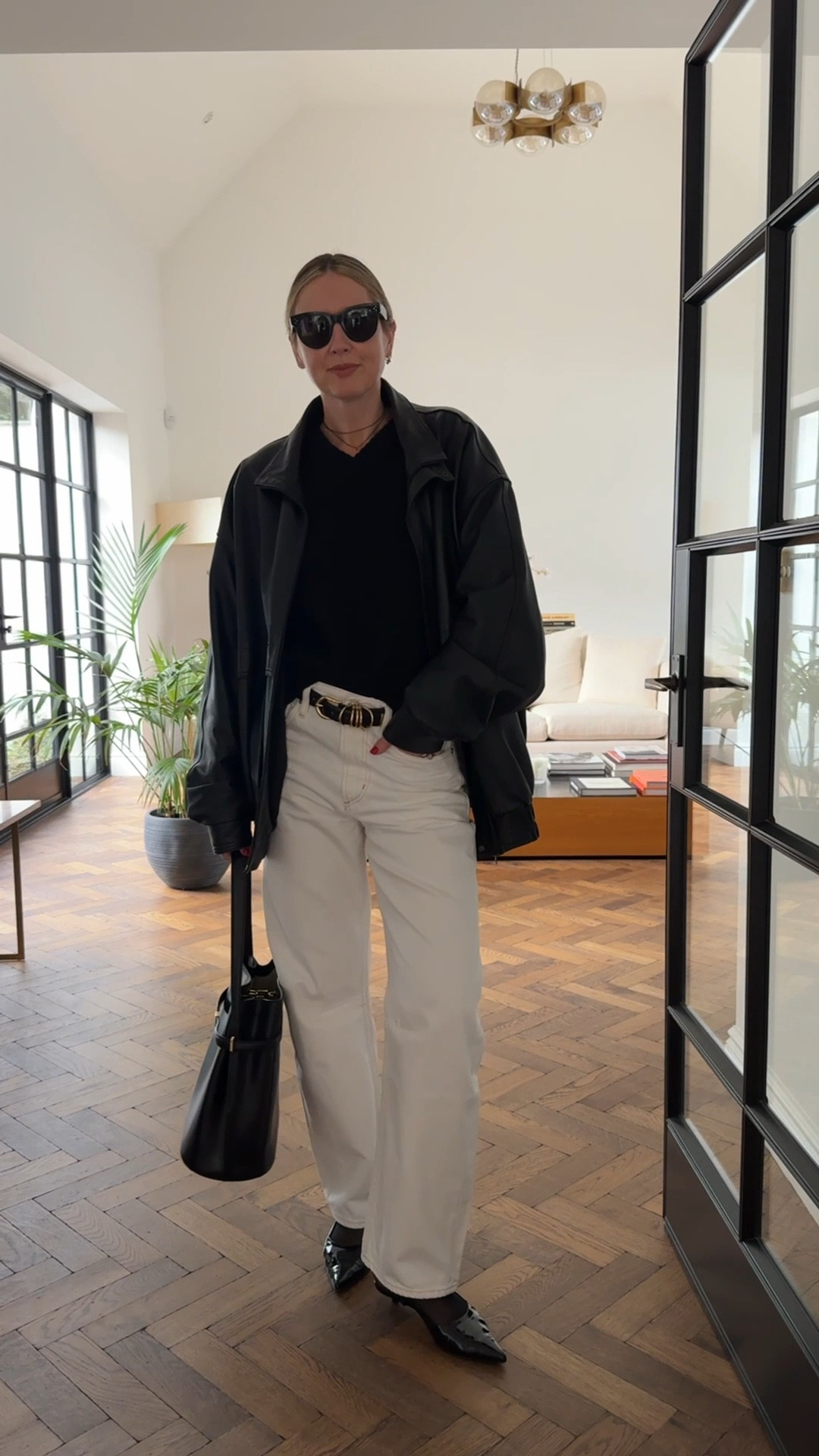 Leather Jacket + White jeans + Toteme Bag 

#LTKuk #LTKspring #LTKworkwear