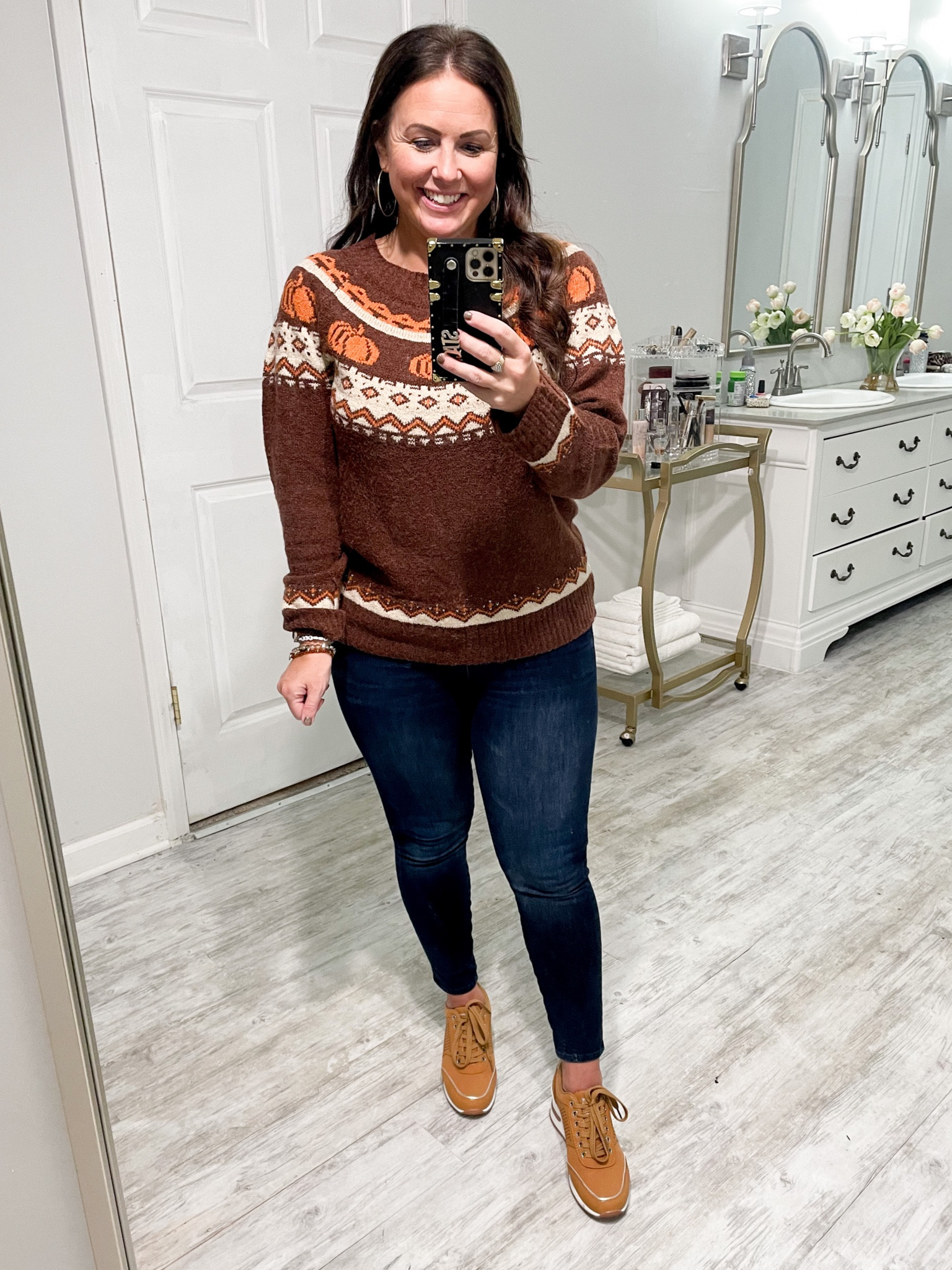 This sweater is a MUST HAVE for fall!!! It is so soft and the cutest print. Wearing it now with platform sneakers but I can’t wait for cooler weather to pair it with booties and/or boots! Fits TTS, I’m wearing a medium 🎃

Tags:
Fall sweater
Fall fit
Fall top 
Fall looks
Sweater weather
Pumpkin sweater 
Fair isle sweater
Preppy sweater
Holiday sweater
Thanksgiving outfit
Petite fashion
Petite jeans
Petite denim
Halloween top
Halloween sweater

#LTKHalloween #LTKunder50 #LTKSeasonal