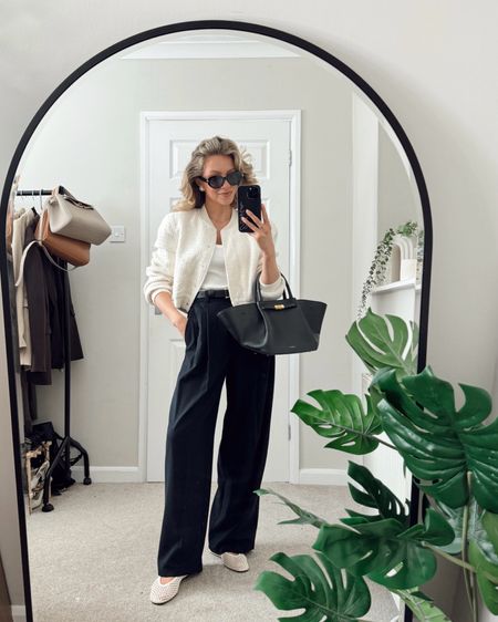 Bomber jacket, black wide leg trousers, mesh ballet flats, white vest tank top, leather tote bag, sunglasses, leather belt

#LTKSeasonal #LTKstyletip #LTKeurope