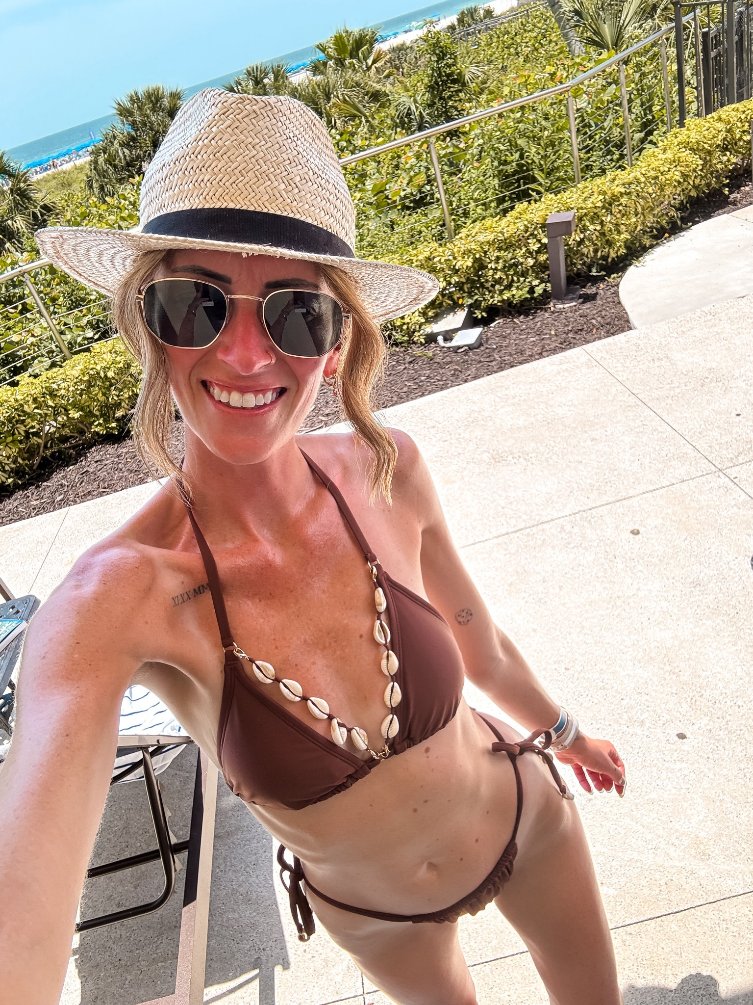 This Target swimsuit is perfect for your next pool day or beach vacation 
Resort wear for vacay days poolside 
Brown bikini seashells swimsuit 

#LTKSwim