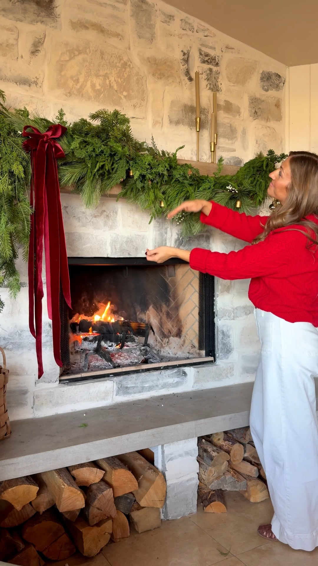 Holiday fireplace styling ideas 🎄 Layered cedar garland, red velvet ribbon, and chunky knit stockings make this Christmas mantel feel nostalgic and warm. Shop my favorite garlands and holiday decor linked on LTK. #christmasmantel #garlanddecor #cozychristmashome #ltkholiday #stonefireplace

#LTKSeasonal #LTKHoliday #LTKHome