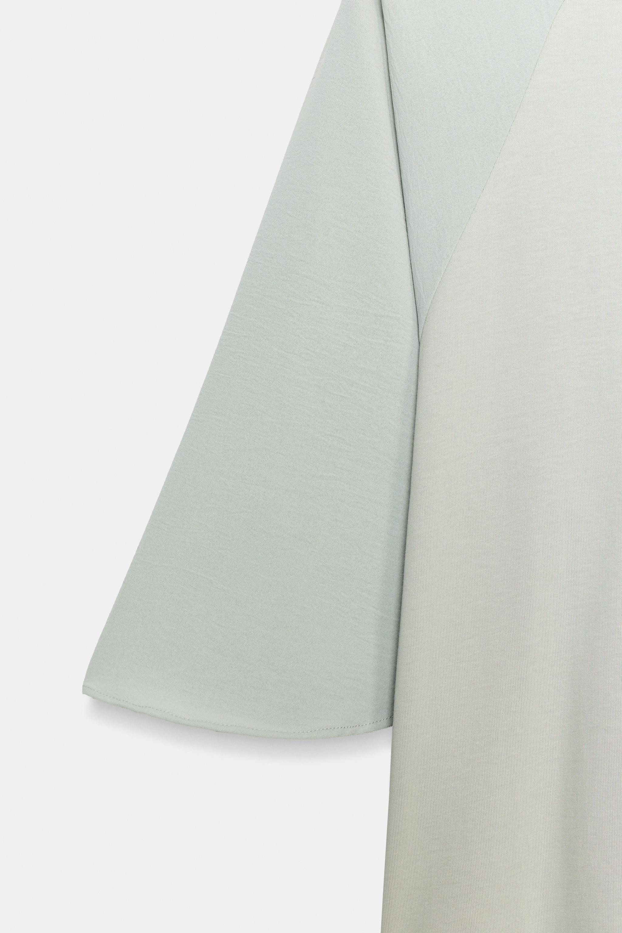 REGULAR FIT - ROUND NECK - REGULAR LENGTH - ASYMMETRICAL SLEEVEST-shirt made of cotton yarn. Roun... | Zara US