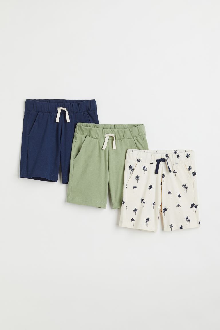 Knee-length shorts in soft cotton jersey with diagonal side pockets. Drawstring and covered elast... | H&M (US + CA)