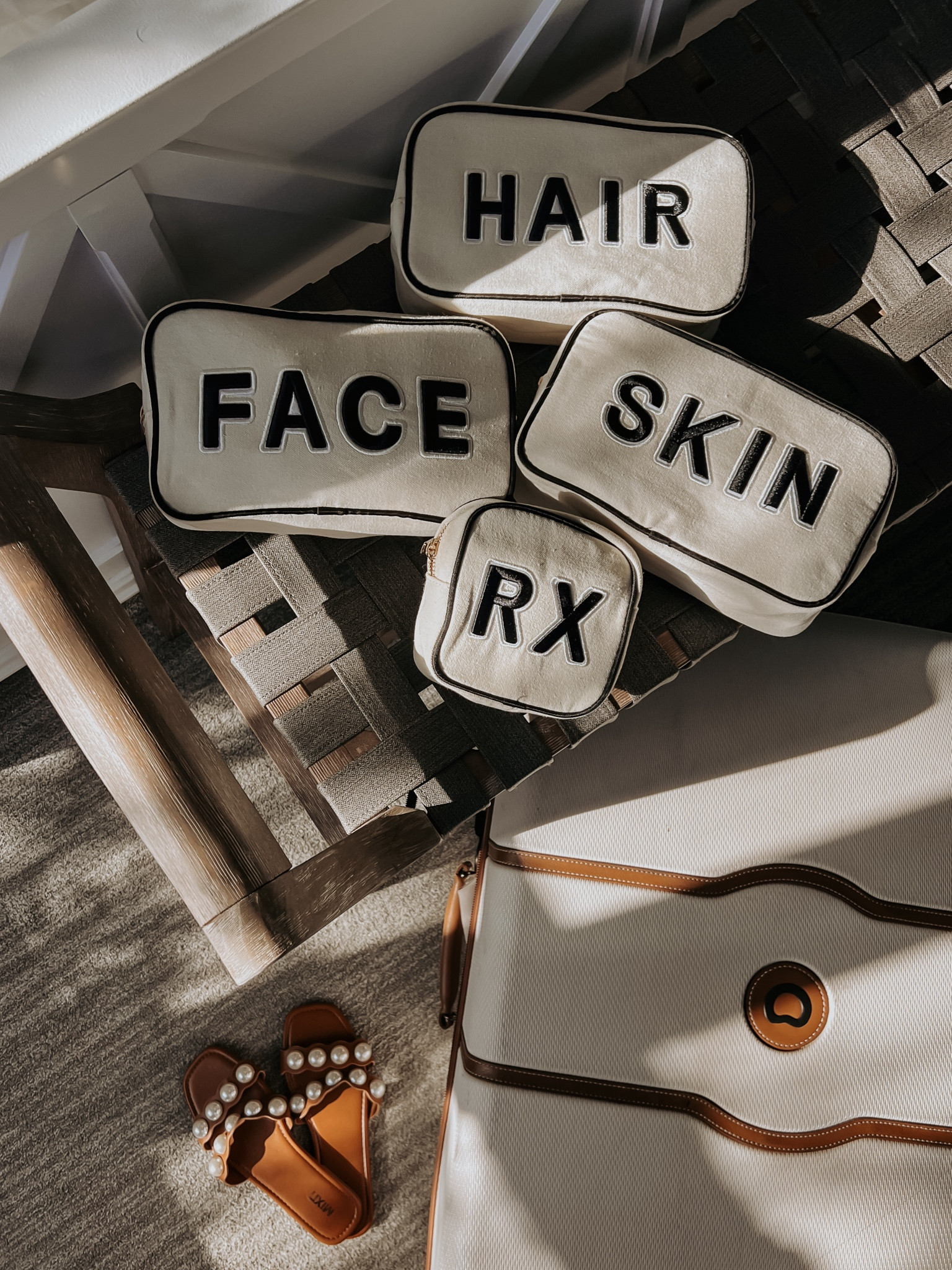 These Pouches are perfect for travel! The inside is wipeable which is a must for me because everything always seems to make a mess! I love the simple font! 

Sandals are from last year  and seem to be sold out! Will link similar  

#LTKTravel #LTKItBag