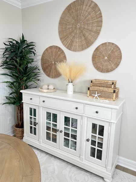 This pretty white buffet cabinet is my favorite piece of furniture and just beautiful next to my round wood dining table! #amazon #amazonhome #founditonamazon #home #interiordesign #homedecor #sideboard #buffet #diningroom #fauxtree #arearug #walldecor #diningtable #woodtable #roundtable

#LTKhome