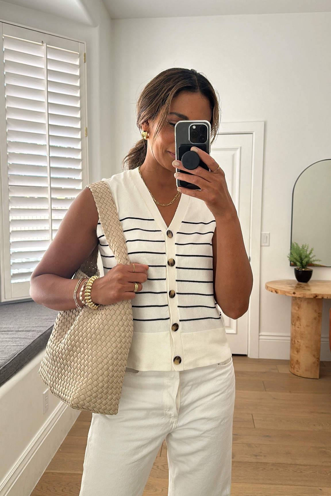 CLASSIC OUTFIT INSPO//this lightweight vest is so chic for warmer months!! Paired with white denim and gold accessories. All fit true to size.



#LTKOver40 #LTKStyleTip