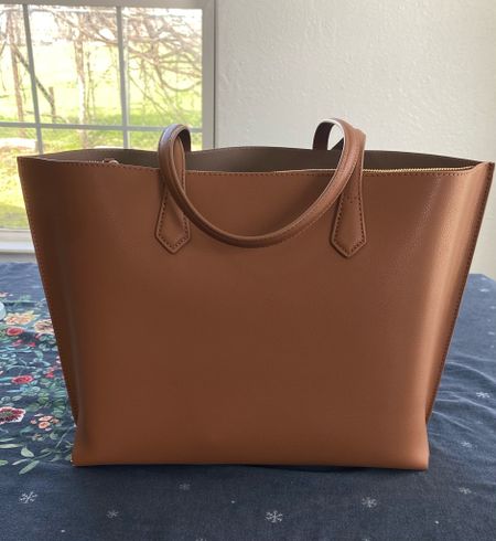 Beautiful Italian leather tote - for a fraction of the price! Classic accessory for work wear, the home office, or an anywhere you need a roomy tote for all the things. 

Shown in “cognac,” available in beautiful leather shades. 

#LTKworkwear #LTKitbag