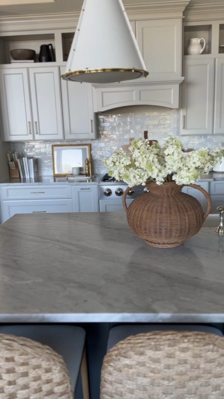 With a more grey toned kitchen, it’s important to me to include texture and brown tones to create a neutral yet warm balance. I love this large wicker vase from McGee & Co. and it’s the perfect centerpiece with these faux real touch lilacs! 

#LTKHome #LTKStyleTip