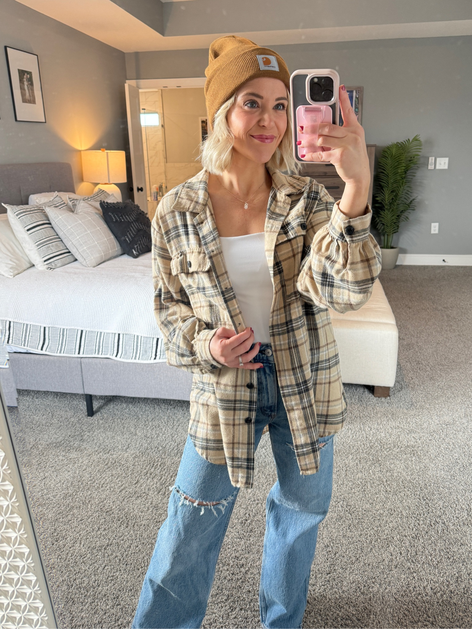 Love an oversized flannel for an easy casual fall look 😍 paired here with a bodysuit (tts - wearing S) & jeans + carhartt beanie! Wearing men’s hat here but linked a cute women’s option too! can’t find this exact flannel so I linked several options 🤎

Fall look / petite style / casual ootd 

#LTKSeasonal #LTKFindsUnder50