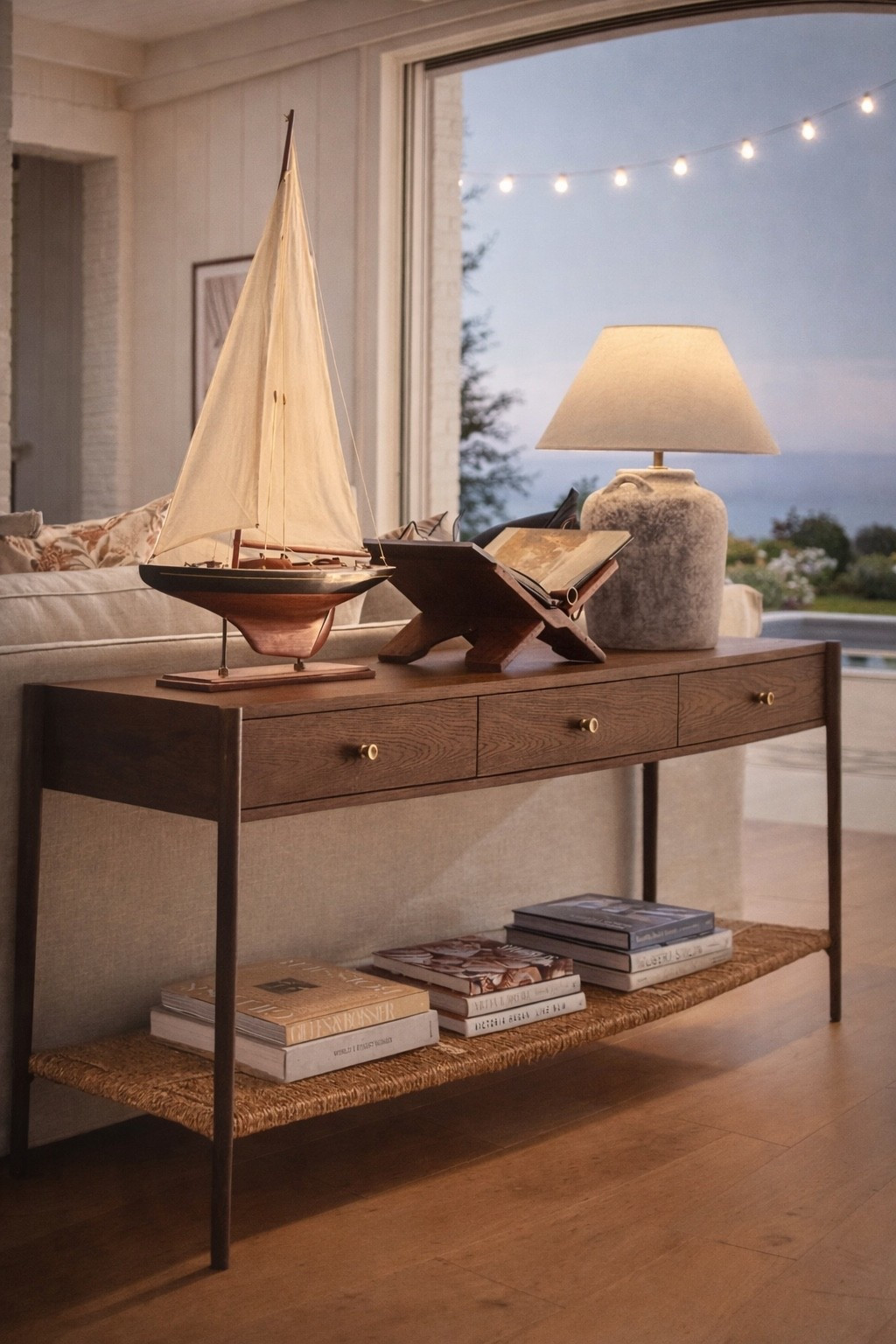 McGee & Co. Summer console living room setup with cement lamp, wood book holder display and coastal decor ⛵️

#LTKSeasonal #LTKHome