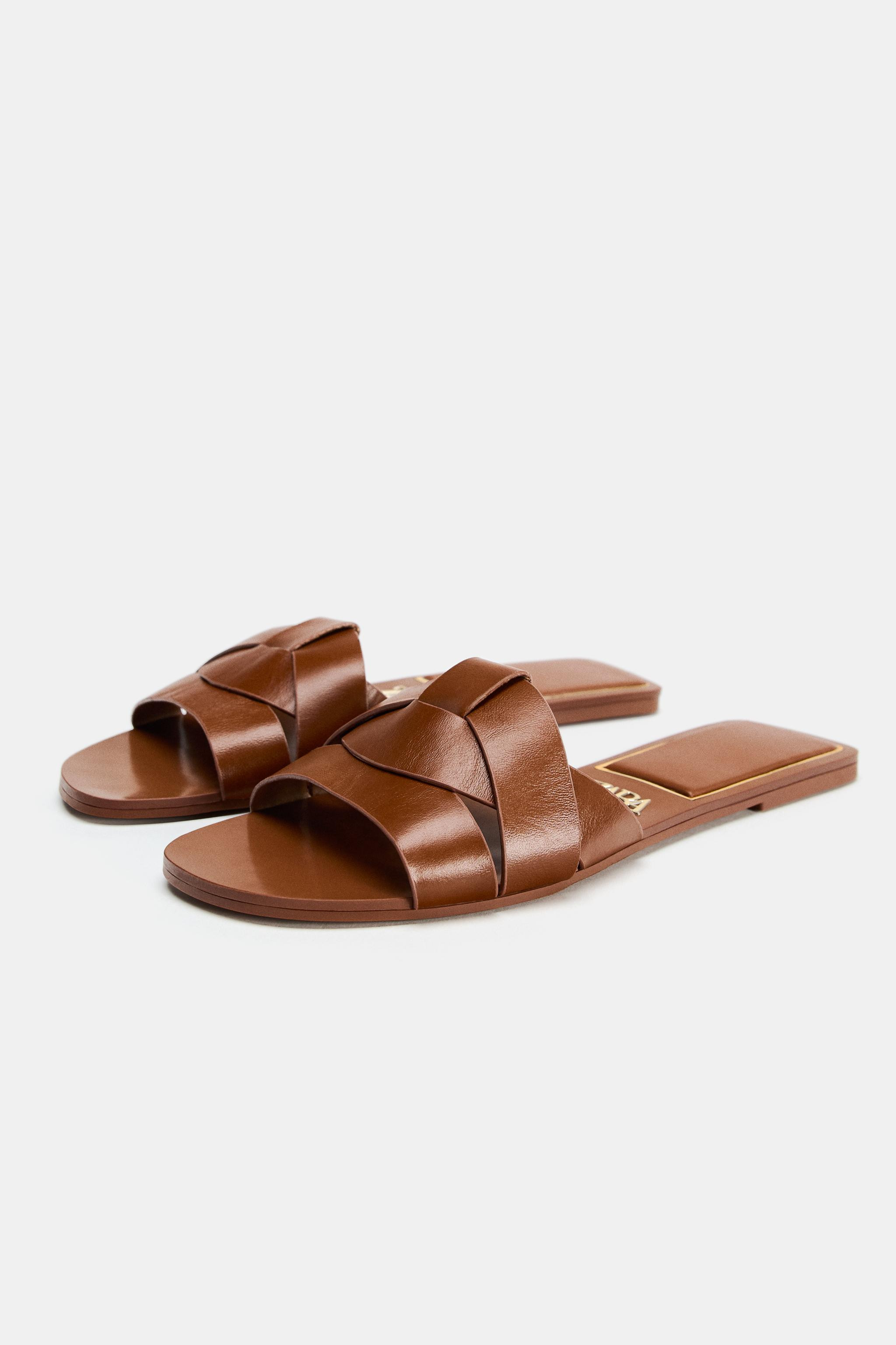 FLAT CROSSED LEATHER SANDALS | Zara US