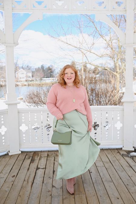 When the calendar says it’s spring, but the weather says otherwise…🙃🥶I wore this outfit twice this week - on Thursday night for dinner with a girlfriend and then yesterday afternoon for lunch in Detroit with Kyle. The colors are super springy, but the styling with the duster coat, booties, and sweater keep it transitional.

This satin slip skirt is on sale at @shoparula for $28.99 from $69.95. It’s taken me some time to warm up to this trend. Column shaped skirts have always been intimidating for me because I grew up seeing them in magazines and catalogs on slim figures that looked nothing like my own. A-line and skater silhouettes have always felt more accessible for my shape.

But part of my body confidence journey means allowing myself access to trends that I previously thought weren’t meant for me and my body. I’m grateful to plus size brands providing us with these trends so we finally can give these styles a try. Even so, I went back and forth about ordering this skirt for more than a month.

I ultimately decided to give it a go because I love the color, and while the fabric is lustrous and elegant, there’s also casual styling potential. Yes, I have lumps and bumps and cellulite, and yes, you can see some of that through the skirt. But this is my body right now, this is a style I want to experiment with right now, and I’m giving myself permission to wear it.

I LOVE how this outfit came together. The colors, the layered necklaces, and the effortless silhouette tick every box for me. I bought this skirt as a spring essential I plan to wear on heavy rotation and style a variety of ways over the coming months. 



#LTKmidsize #LTKplussize #LTKSeasonal