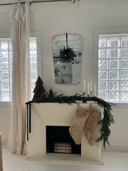 Mantle Christmas decor - Christmas wreath, Christmas stockings, garland, gold framed mirror

#LTKHoliday #LTKhome #LTKstyletip