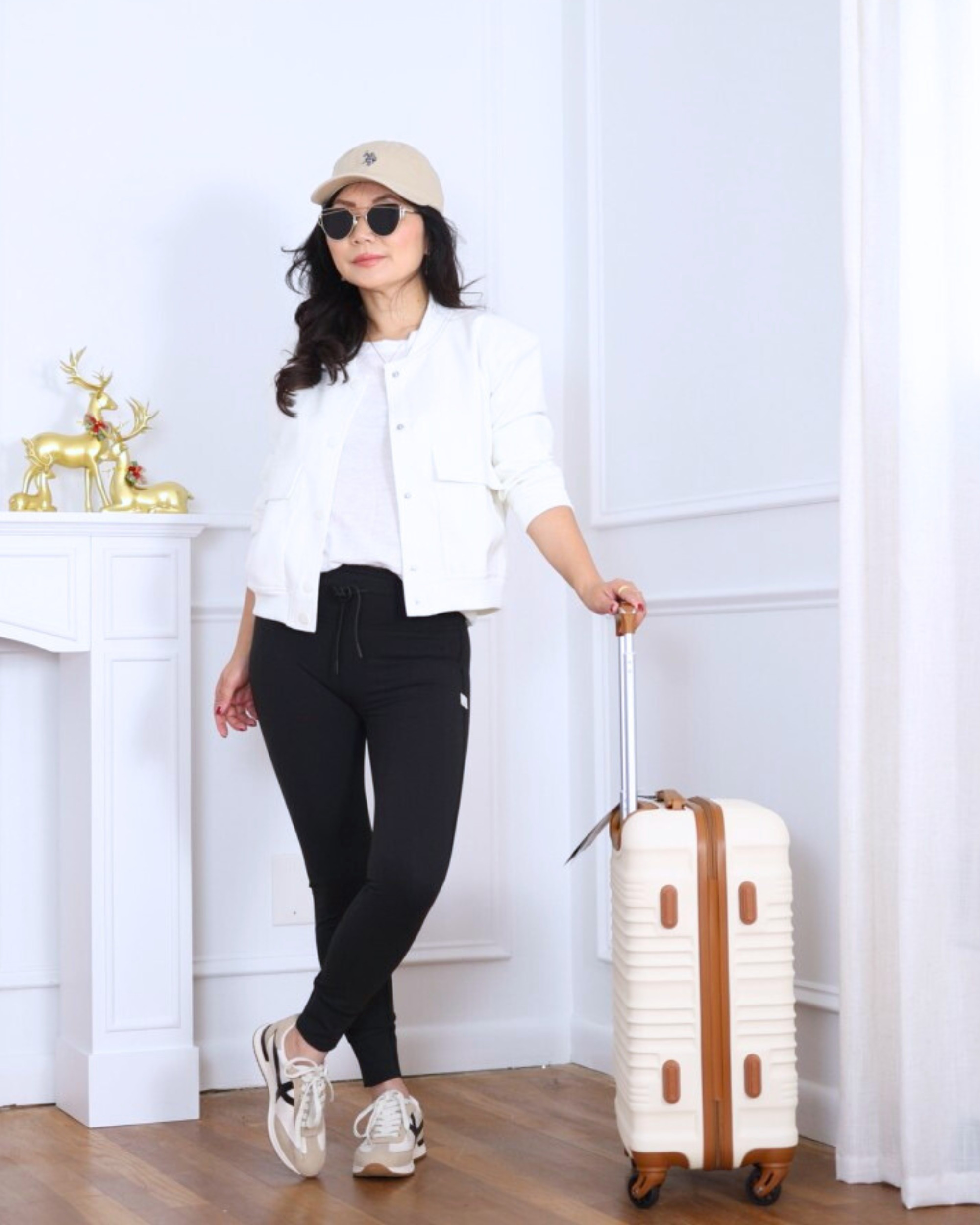 Comfort-first but still put-together — this Amazon bomber jacket layered over a white tee, leggings, and sneakers is my go-to travel outfit. Easy, relaxed, and perfect for long days on the move without sacrificing style. I’m 5’2, wearing size XS.

#LTKOver40 #LTKPetite #LTKootd