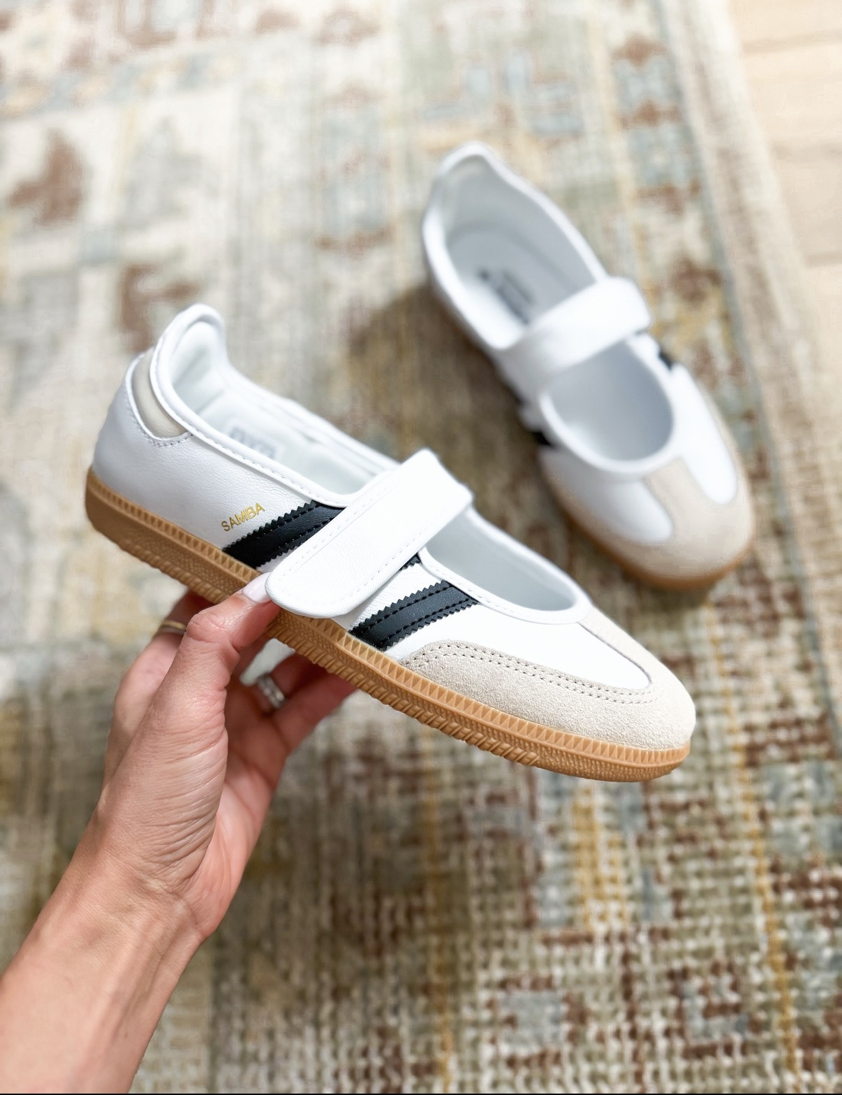 Sneakers I’m excited to wear in 2026! Ballet sneakers. White sneakers. Travel shoes. Travel sneakers. Adidas shoes. Adidas Samba Jane in white and black - runs a smidge big but I didn’t size down because you can tighten strap

#LTKTravel #LTKGiftGuide #LTKActive