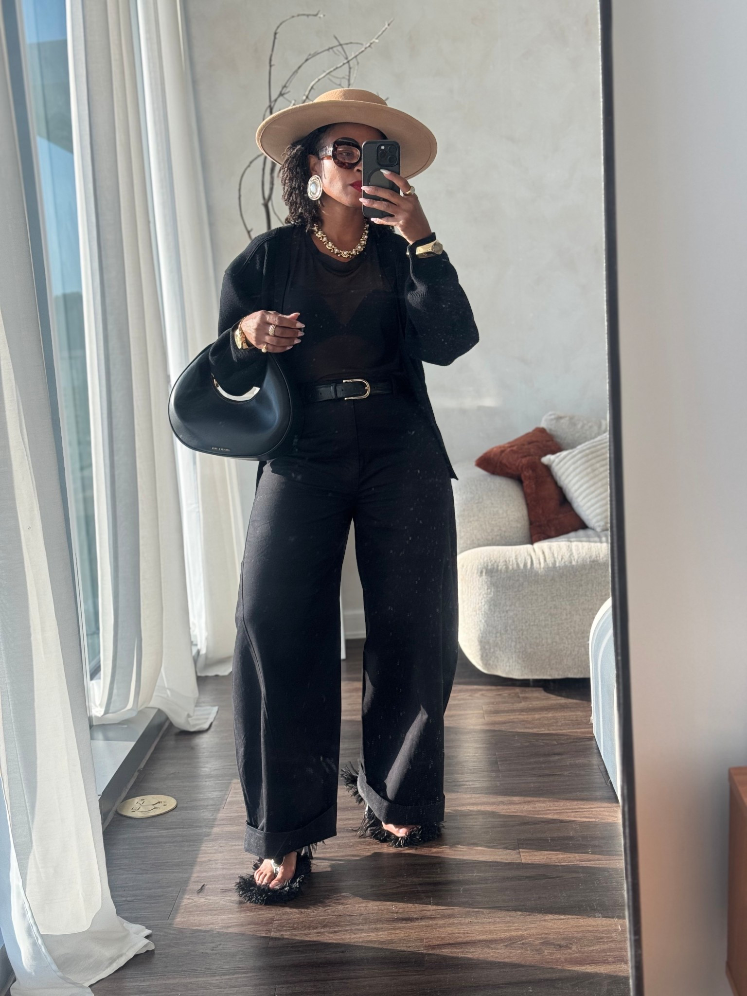 Day 15 .. can’t believe I’m halfway through! Today while imaging my closet decided to go with an all black look with classic pieces and loaded up on gold accessories. FYI black goes with any occasion 

Pants : @cos suggest choosing your  actual size .
Cardigan : urban revive
Zara sheer top 
Shoes :  DIY

#LTKFindsUnder50 #LTKSeasonal #LTKStyleTip