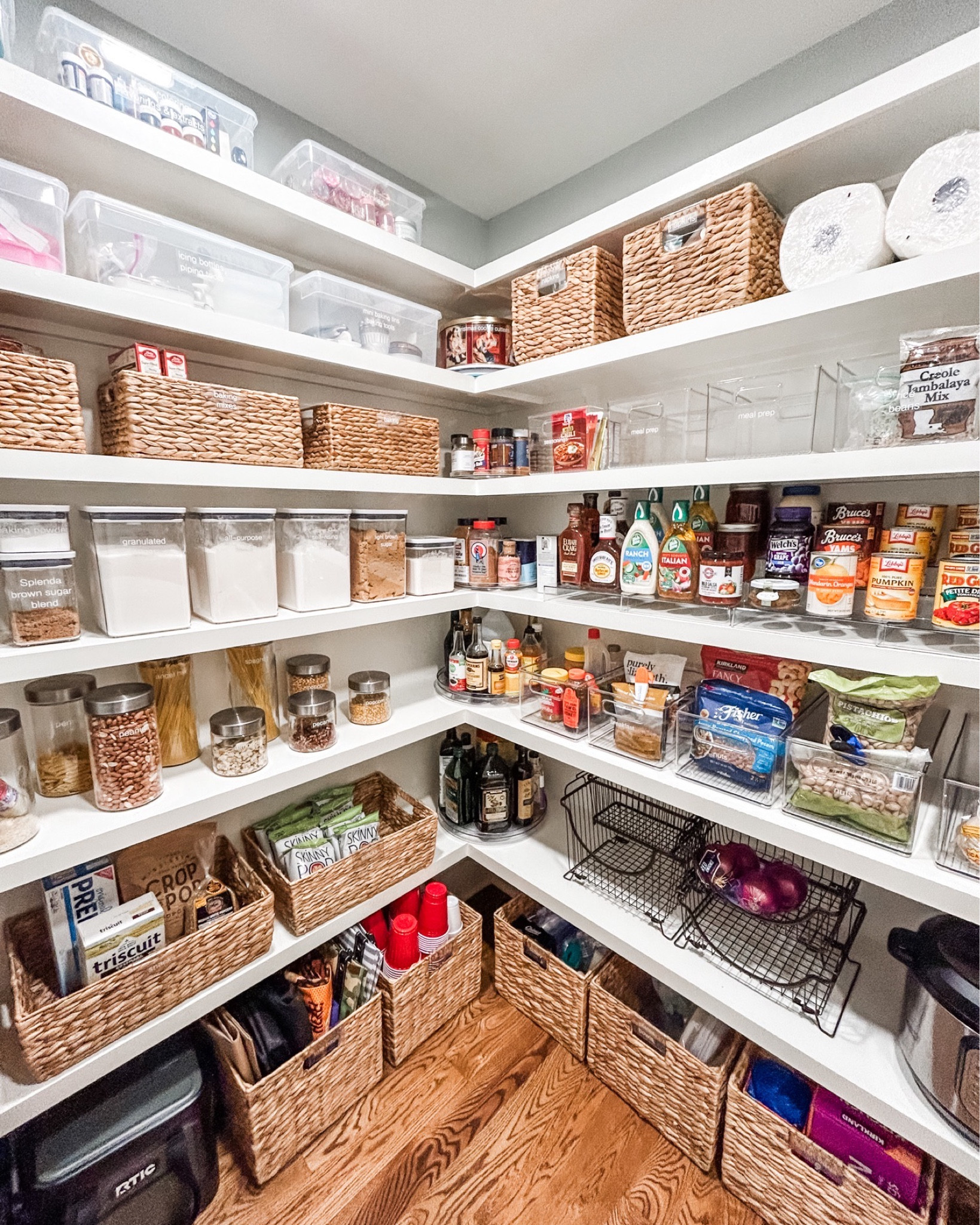 Pictures of our clients' beautiful pantries just never get old. 😍

We took this pantry from kind of chaotic to a super functional place that made our client text us: Love love love it!!

This particular situation came about because our sweet client had two separate pantry spaces and somehow when they moved in, the small pantry space ended up being food and the large one (this one) was for entertaining. Once we did our intake and talked through their family dynamics and how they used their spaces, it became clear (to all of us) that these spaces needed to swap which made each space really work. We love transformations like this - especially when our outside perspective causes shifts that make life easier.
