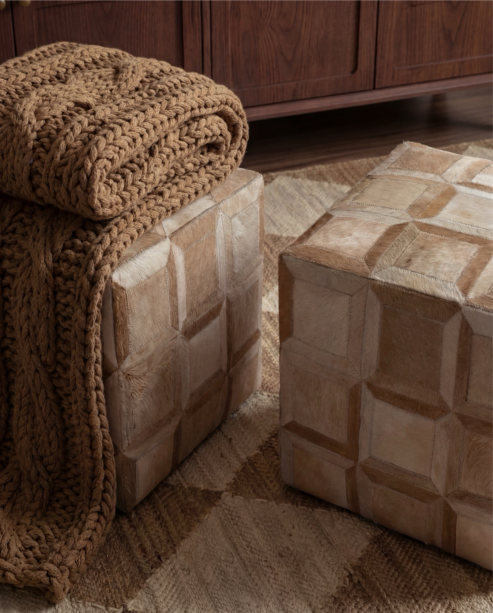 Shop the Look:
• Wood console table
• Framed landscape wall art (black frame)
• Neutral ceramic table lamp
• Stone or ceramic decorative bowl
• Large ceramic vase with faux olive branches
• Textured cube stools (neutral tone)
• Chunky knit throw blanket
• Neutral checkered patterned area rug
White flitted decor bowl
Brass oval serving tray
Brown decor books

#LTKSaleAlert #LTKHome