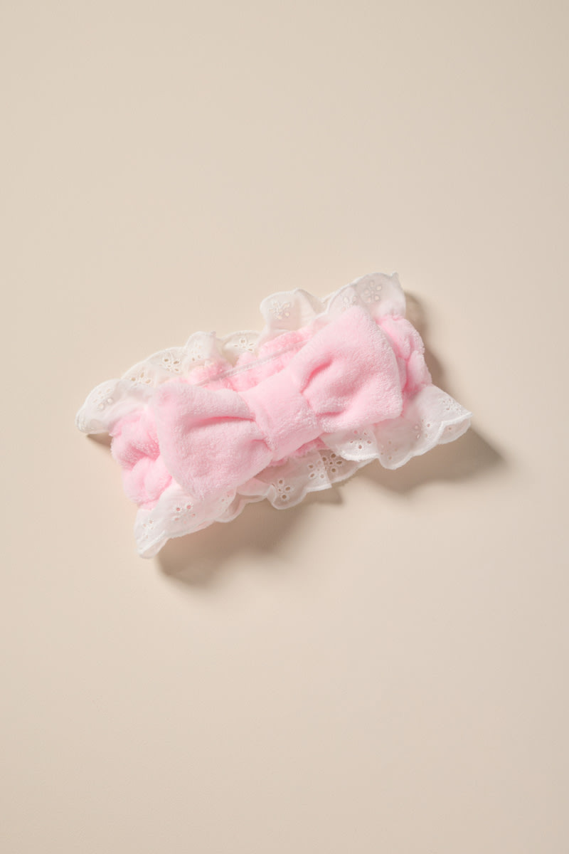 Bow Eyelet Pink Spa Headband | Francesca's