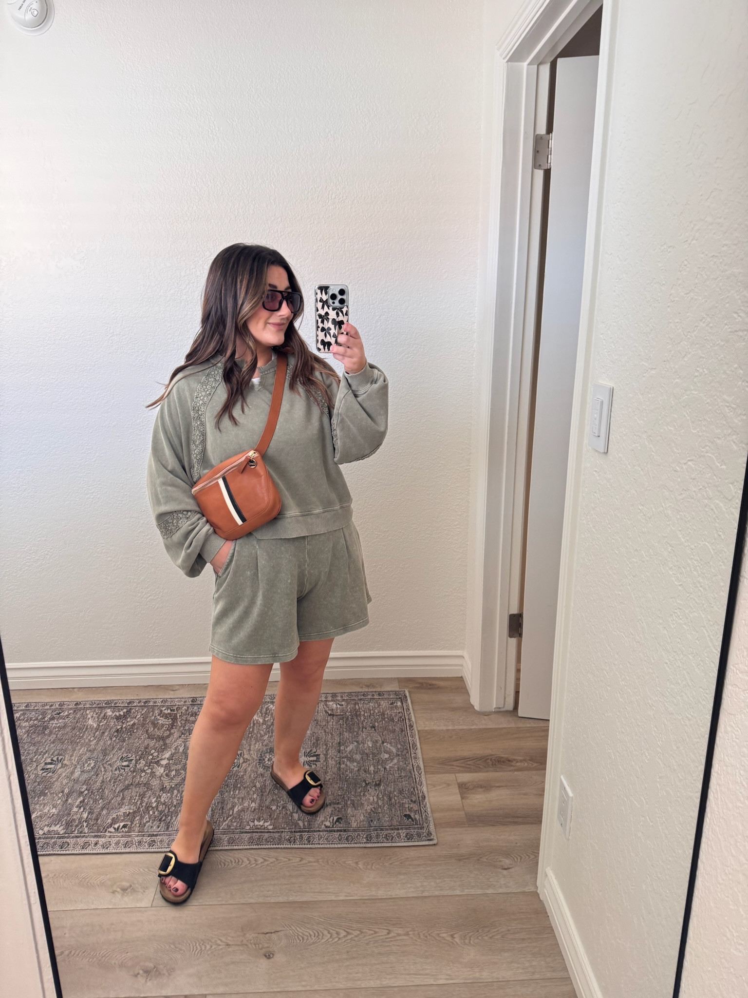 Casual vacation outfit!

Shorts size medium (tts) 
Sweatshirt size xs (runs big) 
Exact bag sold out, linked similar! 

5’0” 145lbs 

Aerie, sweat set, travel set, vacation outfit, style inspo, spring break outfit

#LTKPetite #LTKSaleAlert #LTKTravel