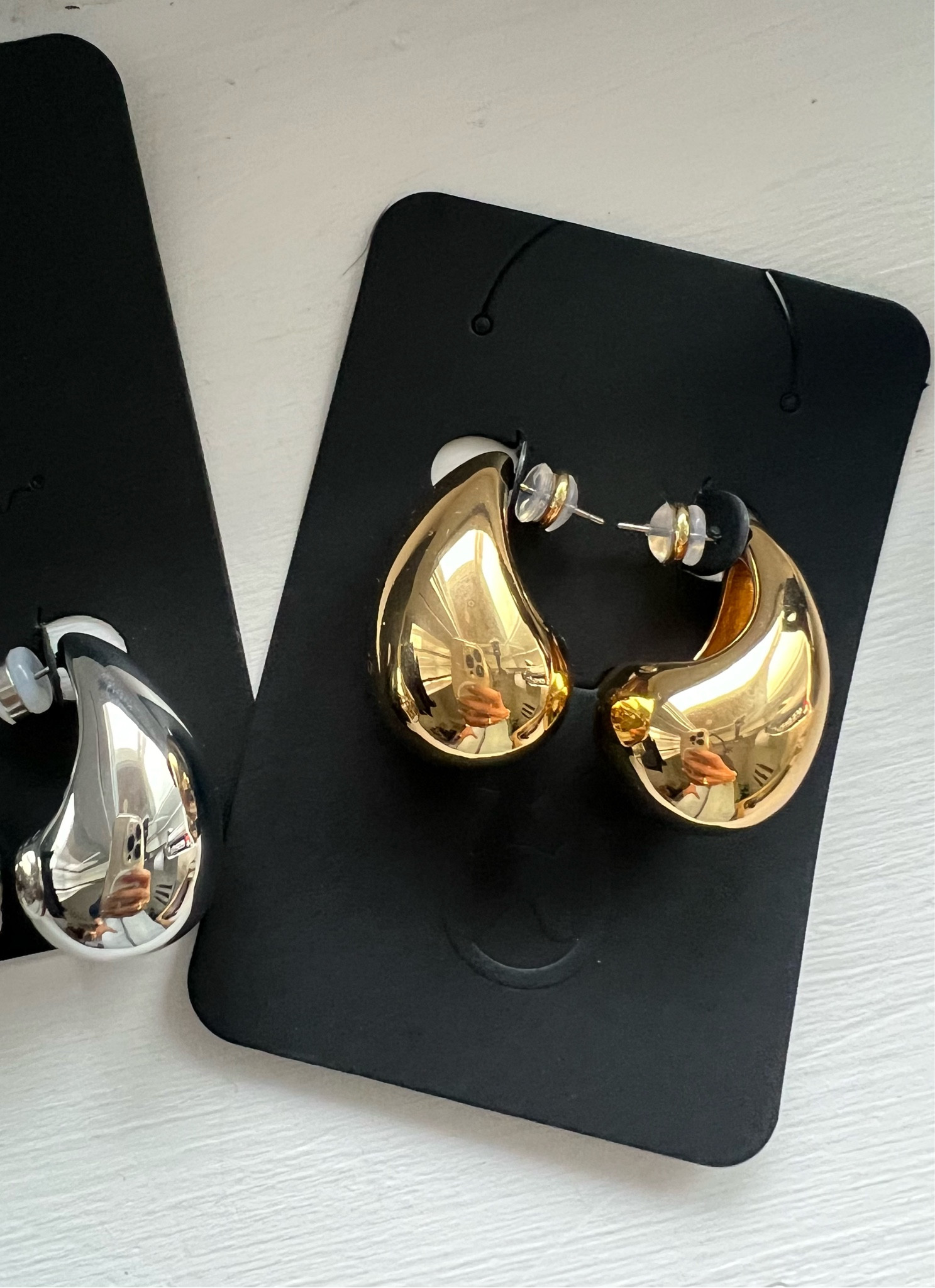 Love these earrings. Very similar to the Bottega earrings.  I have the Etsy ones bath the Amazon ones have the ear pin in the center like the Bottega.  I also use ear stickers for support when I wear heavier earrings 