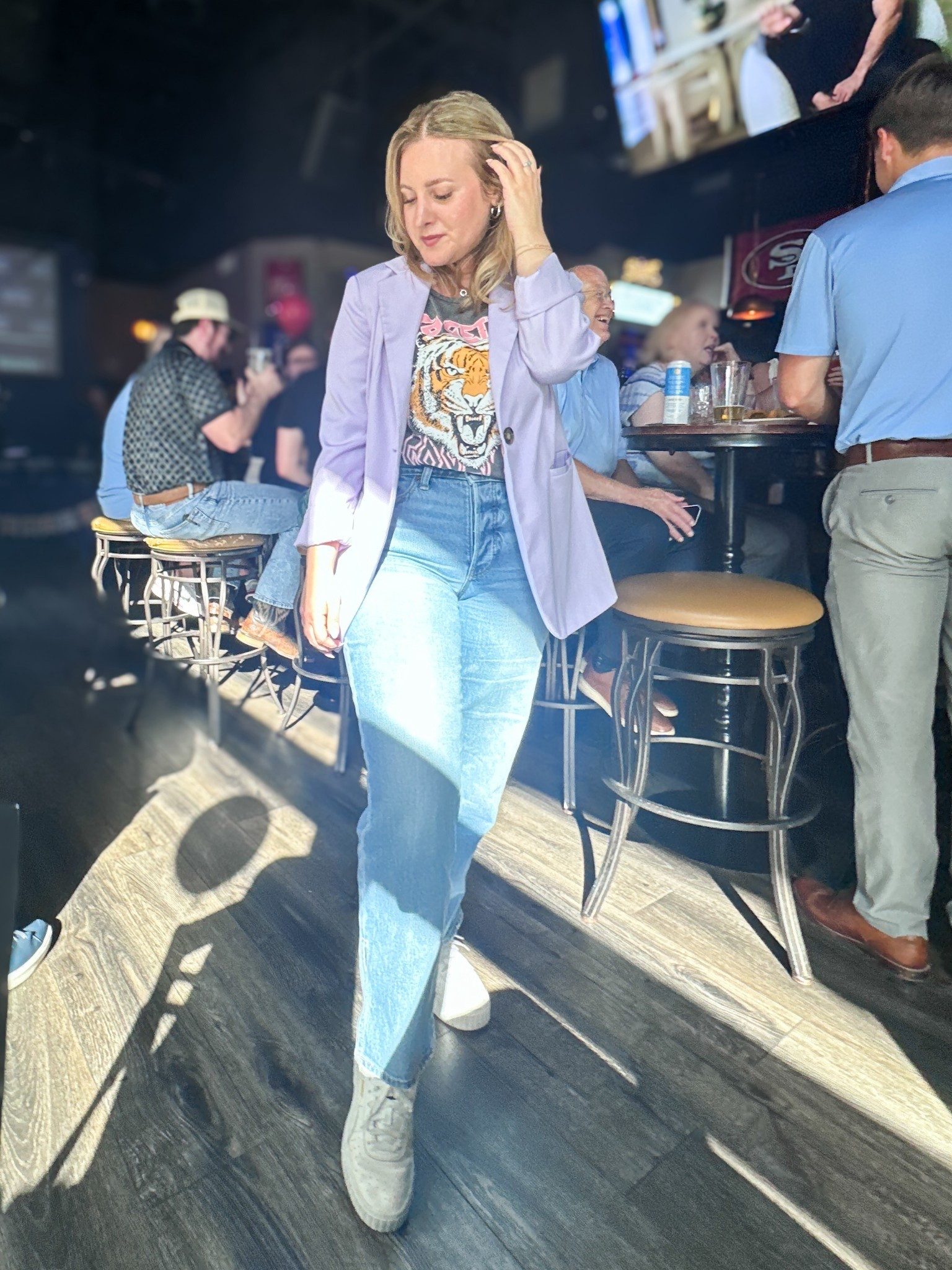 Business casual look. When I don’t really want to dress up but need to look modern and professional, jeans, a graphic t-shirt, and a fun blazer are my go-to! Love this go get em tiger graphic tee with a pop of purple. 

#LTKMidsize #LTKWorkwear #LTKPetite